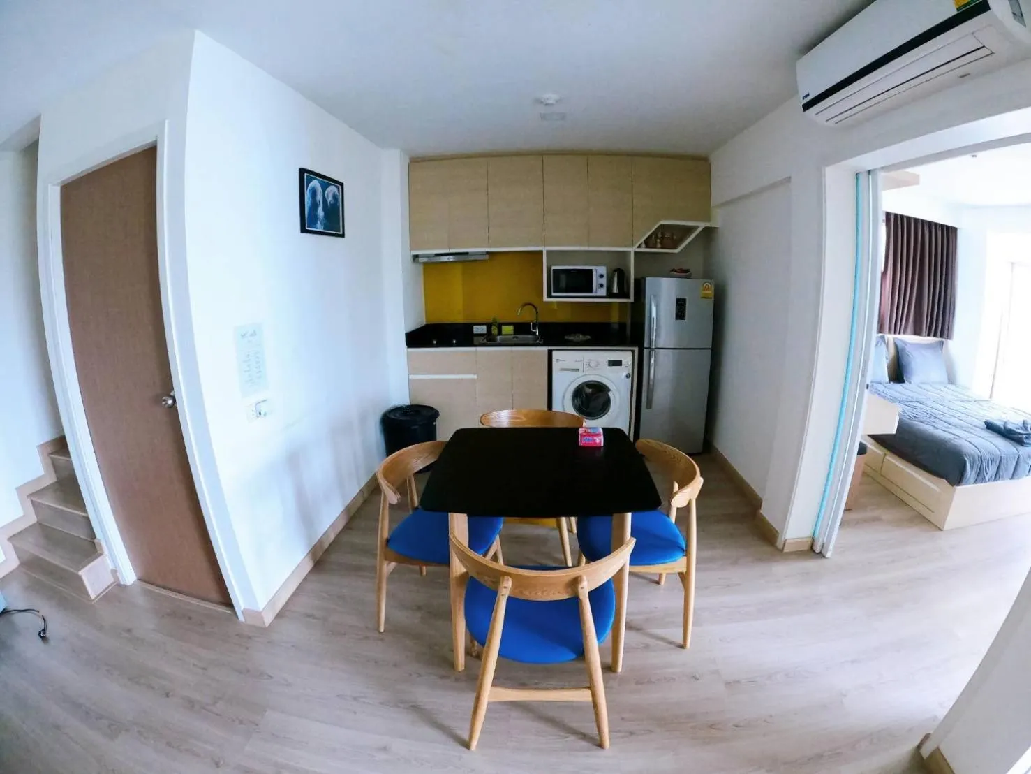 Kitchen or kitchenette in Sonrisa Srirachaที่พักติดทะเล