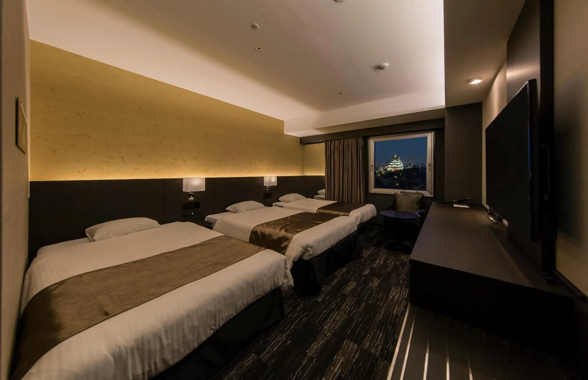 Bed in KKR Hotel Osaka