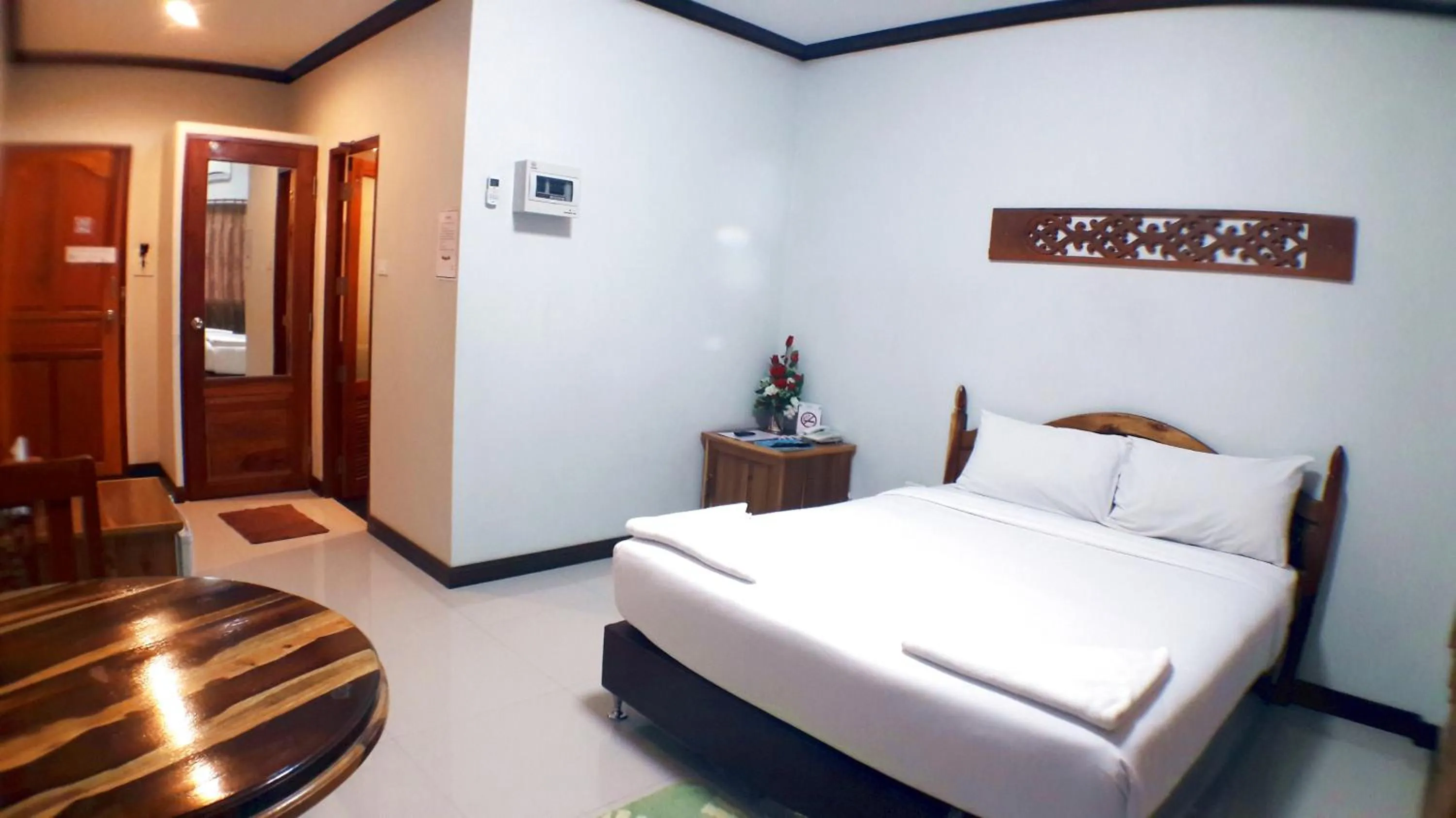 Bed in Khum Nakhon Hotel