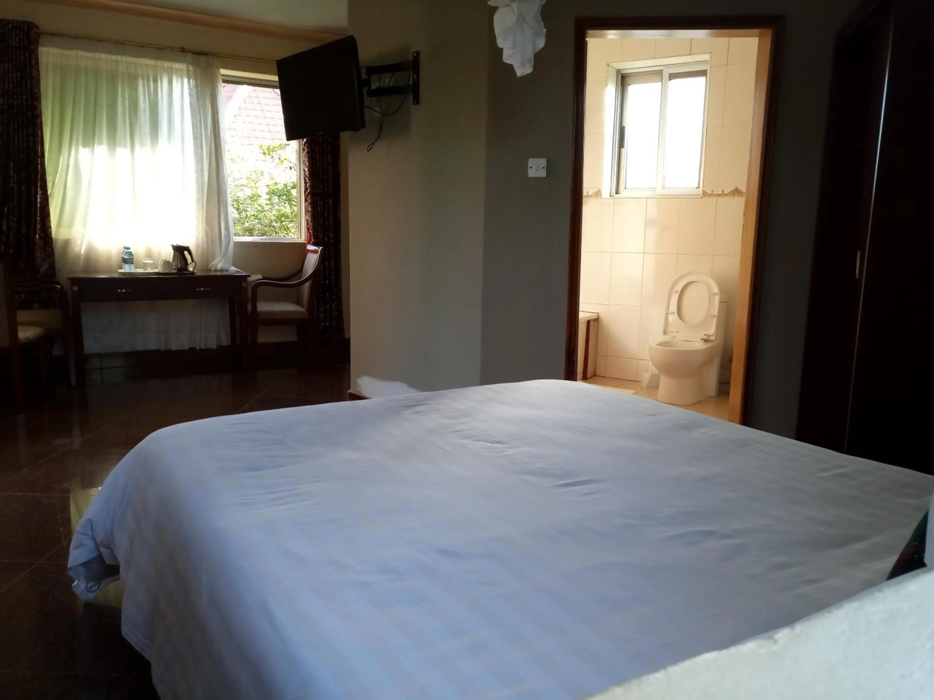 Bed in Asamar Country Resort