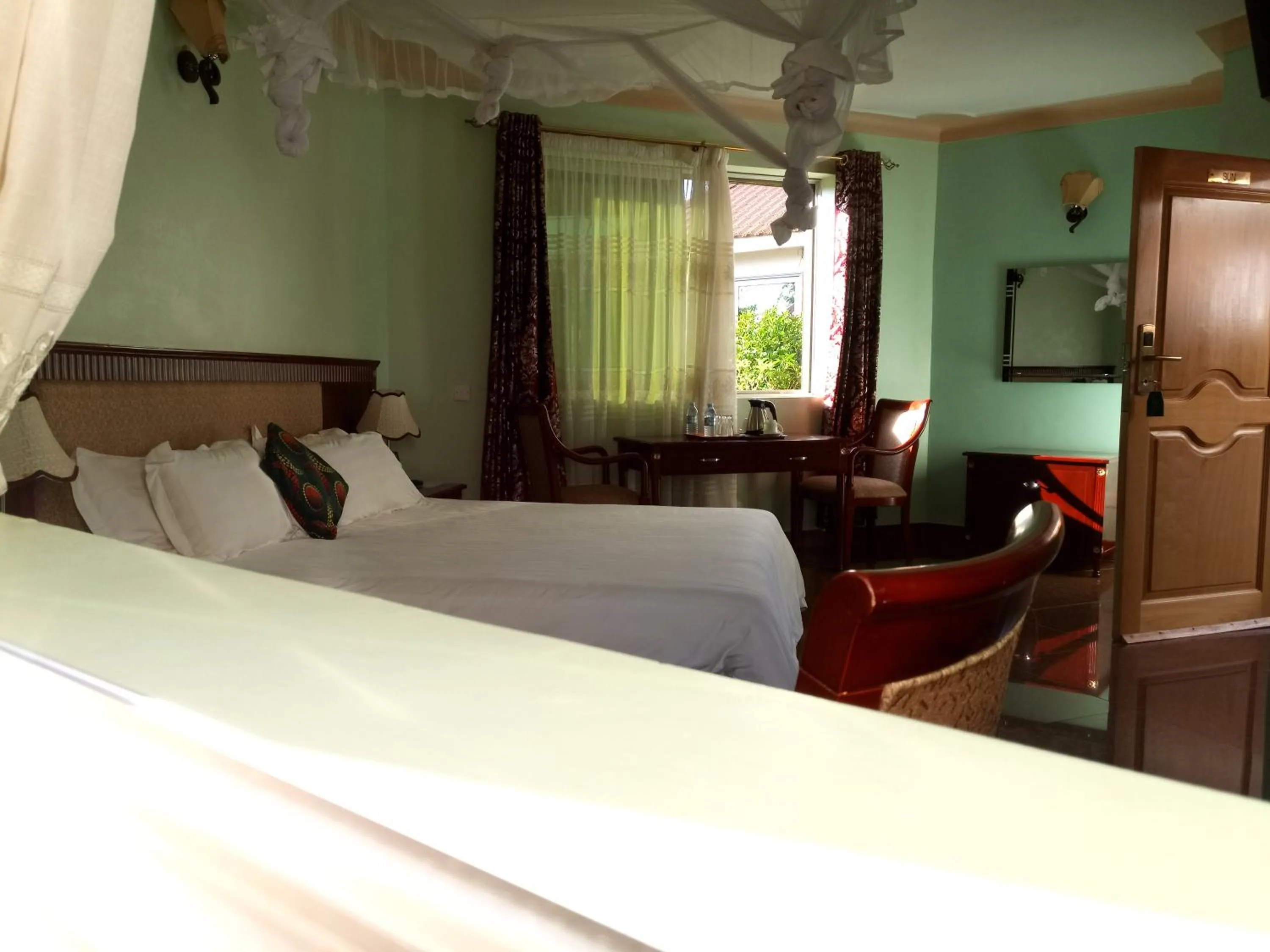 Bed in Asamar Country Resort