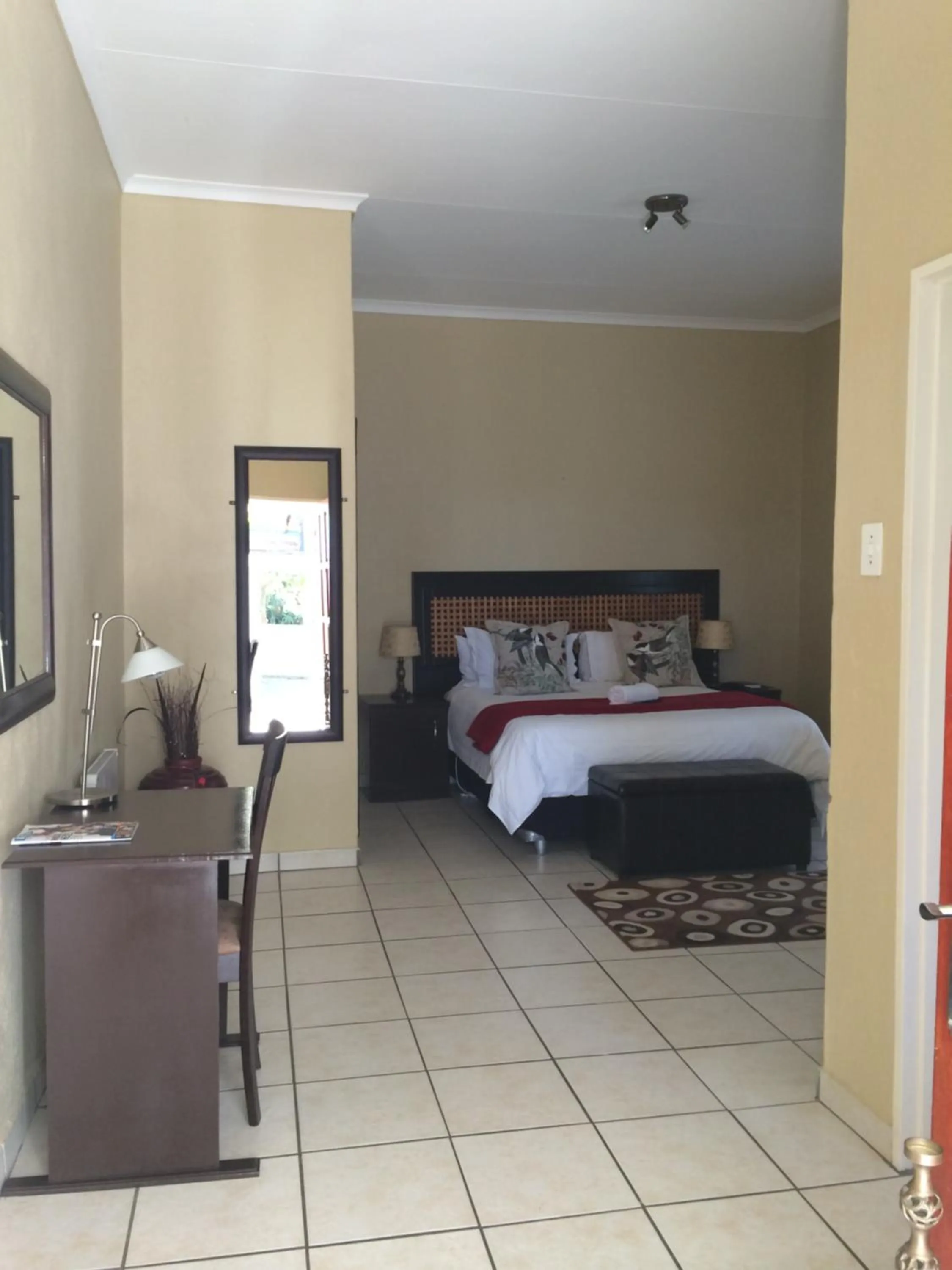 Bedroom in Mcbest Guest House