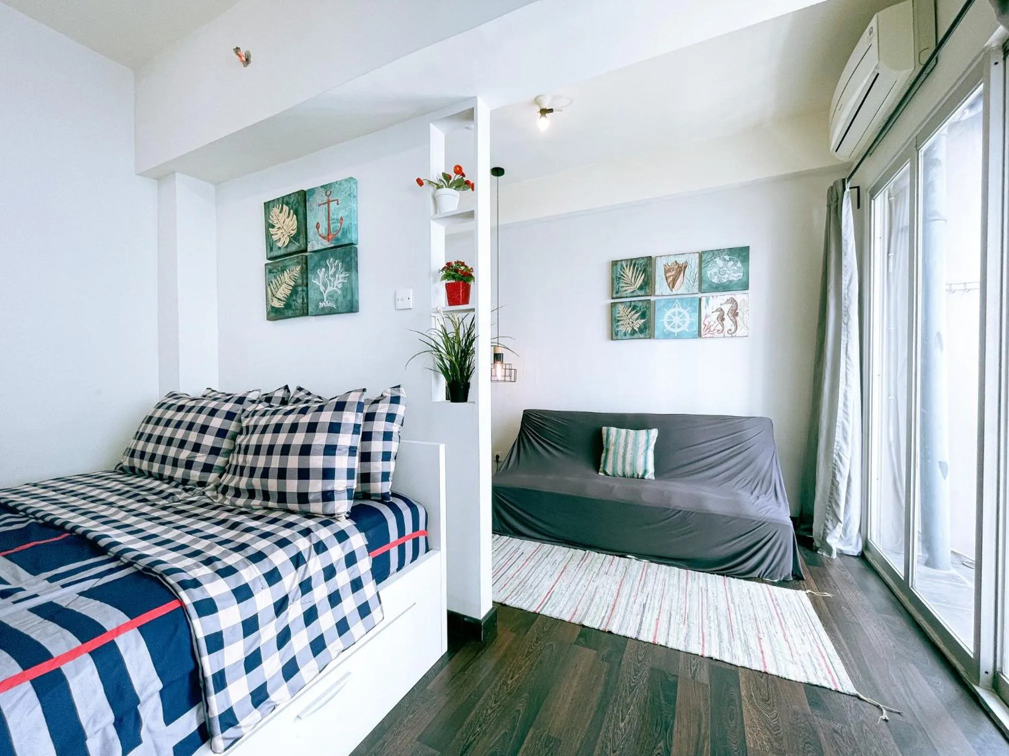 Seating area, Bed in The Satu Stay - Apartemen SGV