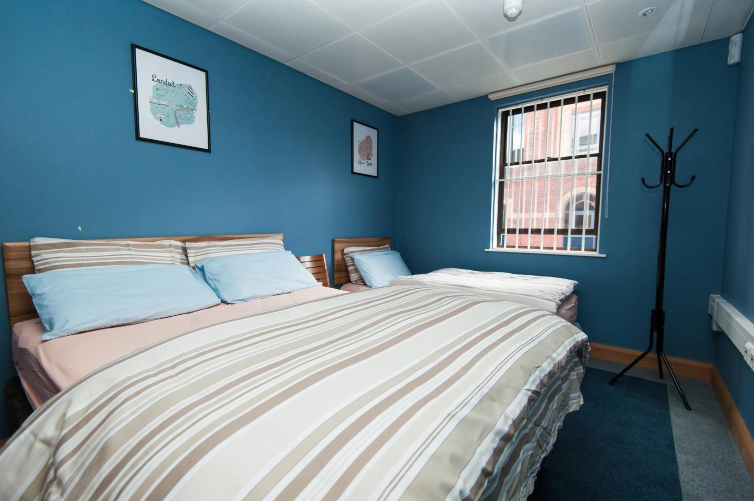 cot in Russell Scott Backpackers Hostel