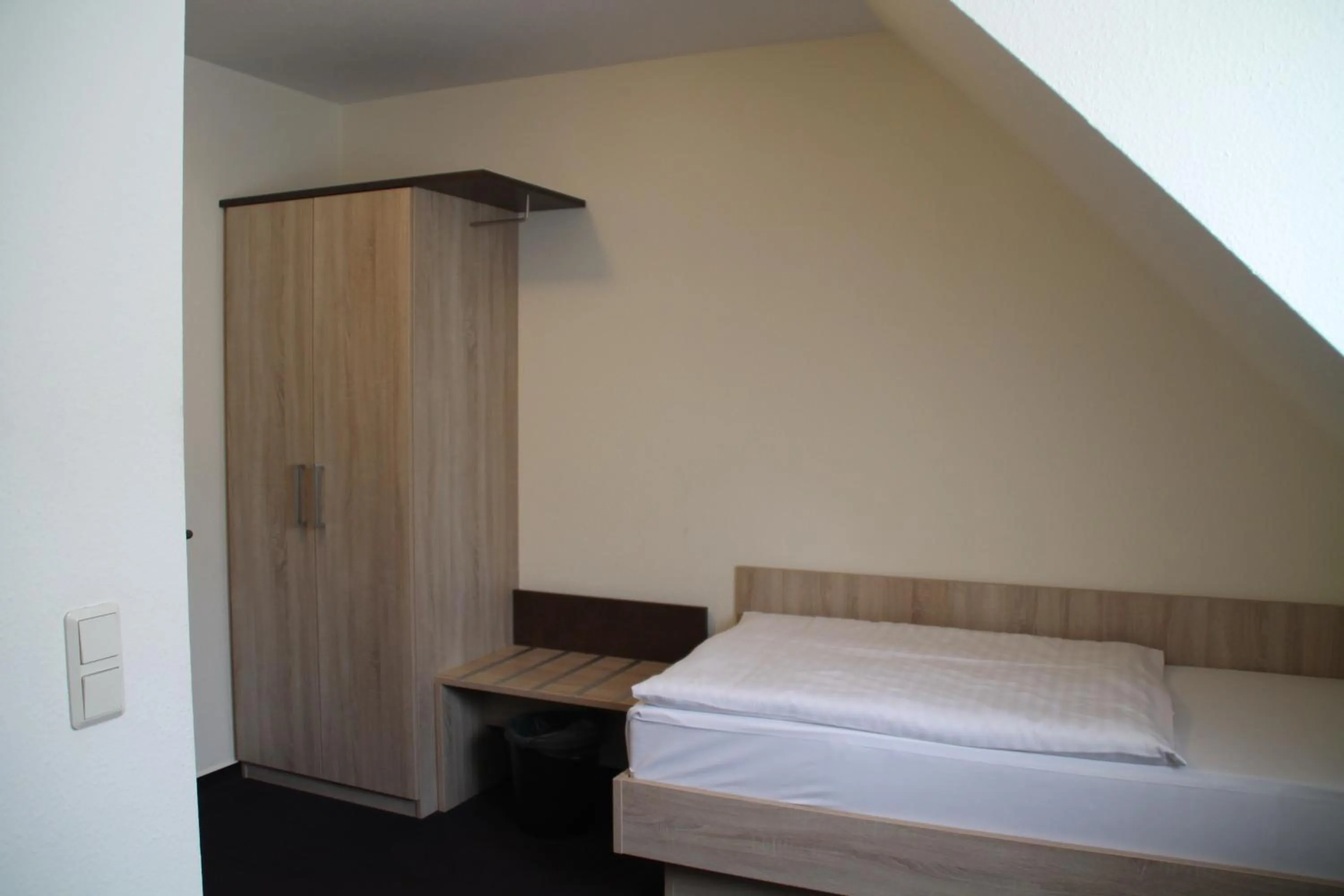 Bed in Hotel Stadt Kamen