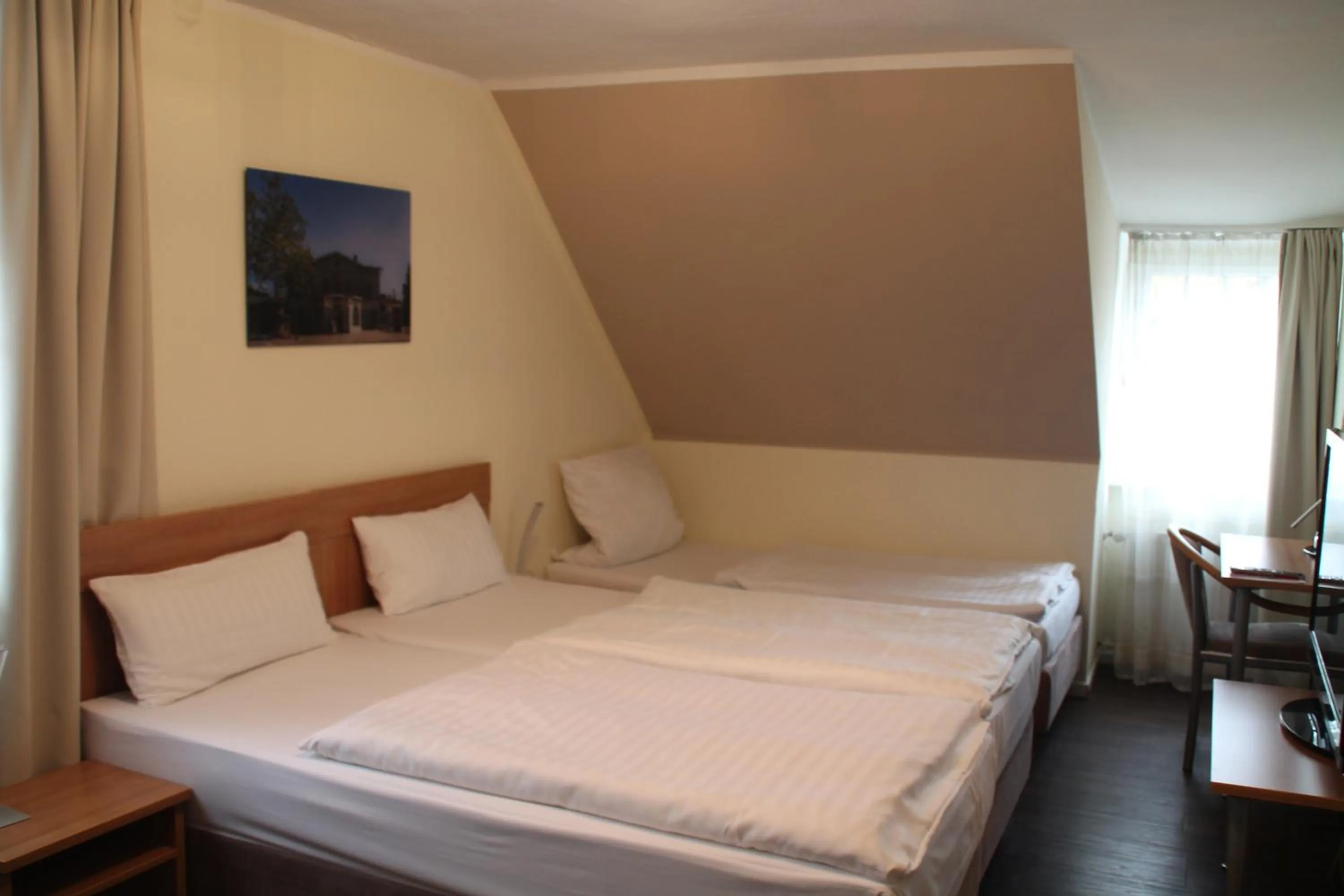 Bed in Hotel Stadt Kamen