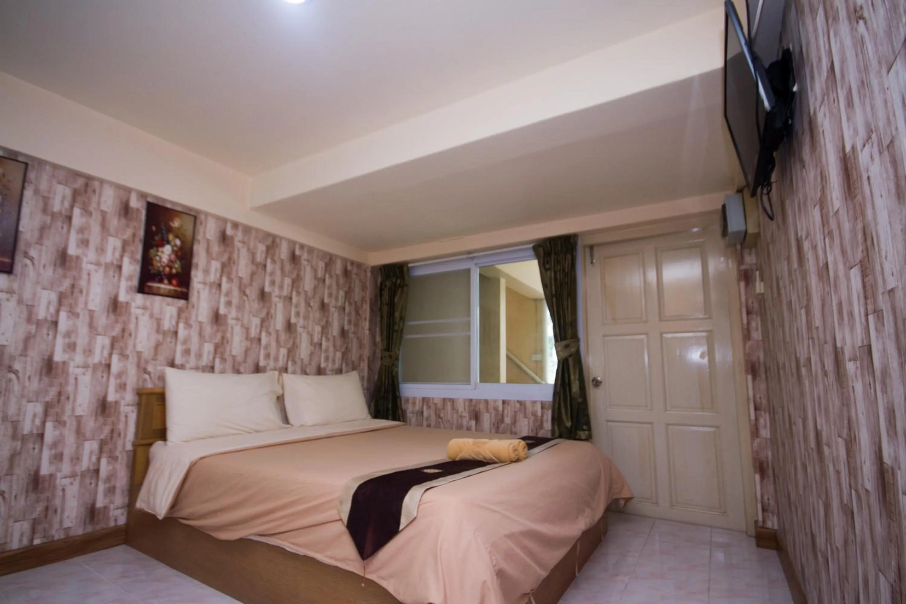 Bed in Jang Sripoom House