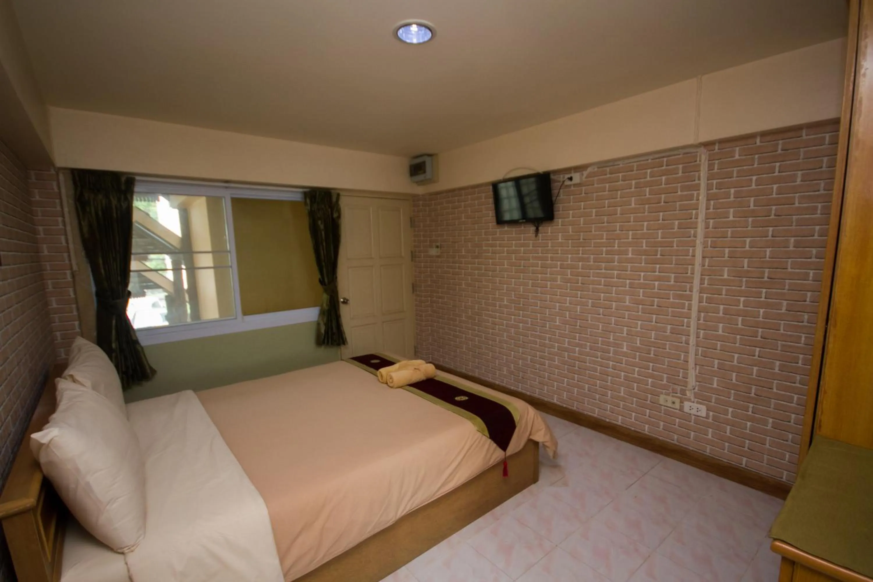 Bed in Jang Sripoom House