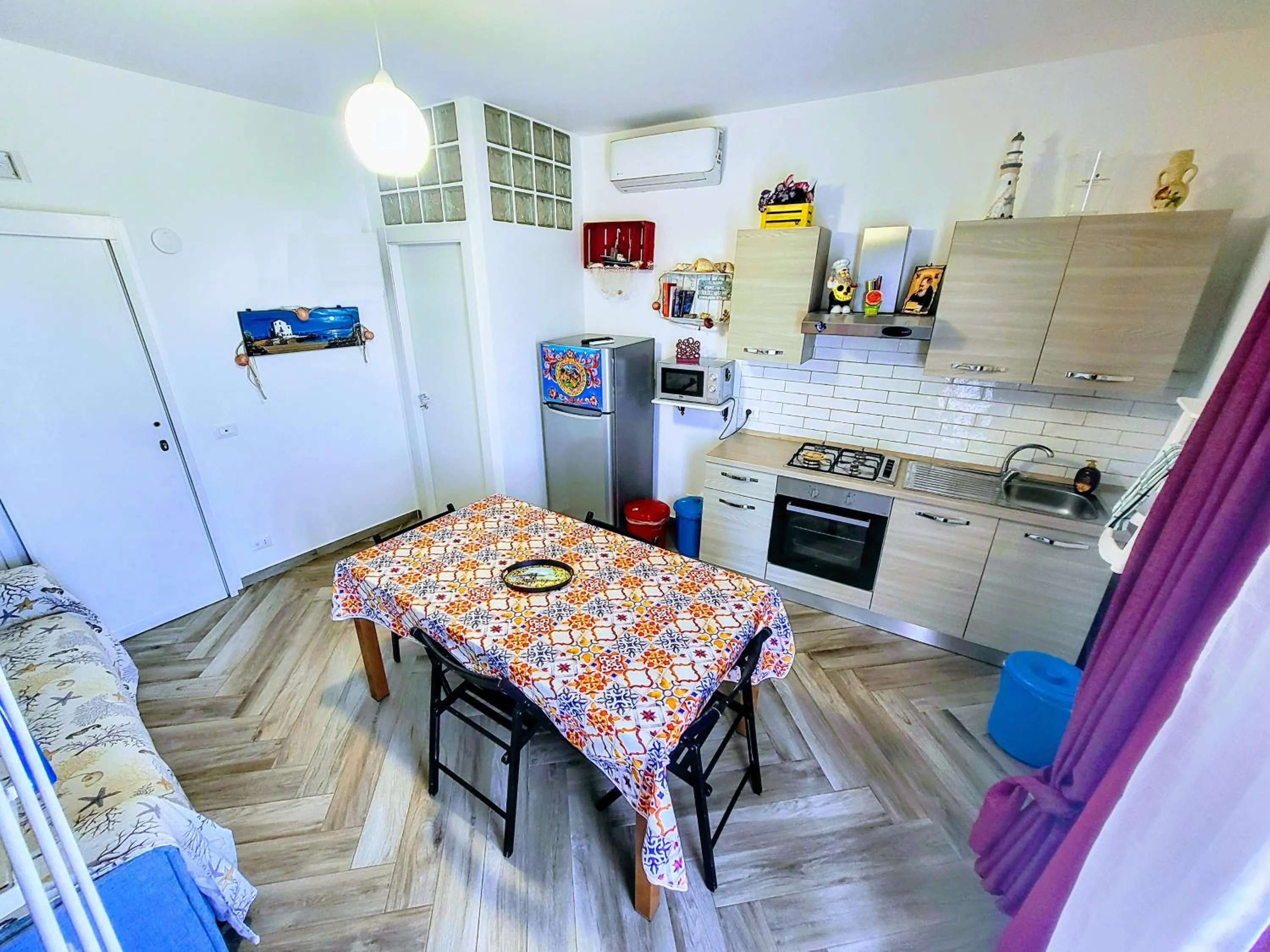 Kitchen or kitchenette in Seafront House Gabbiano Azzurro