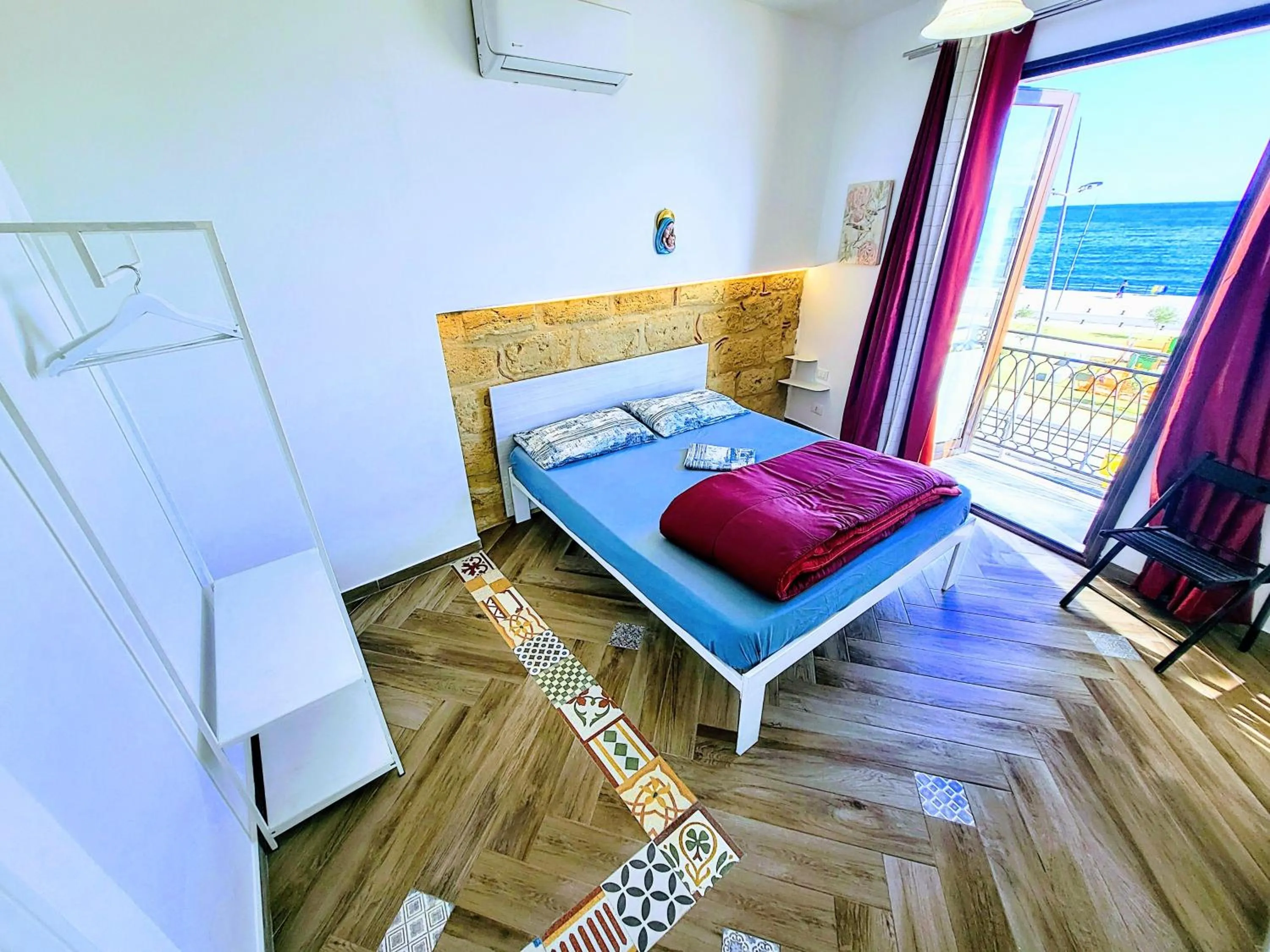 Bed in Seafront House Gabbiano Azzurro