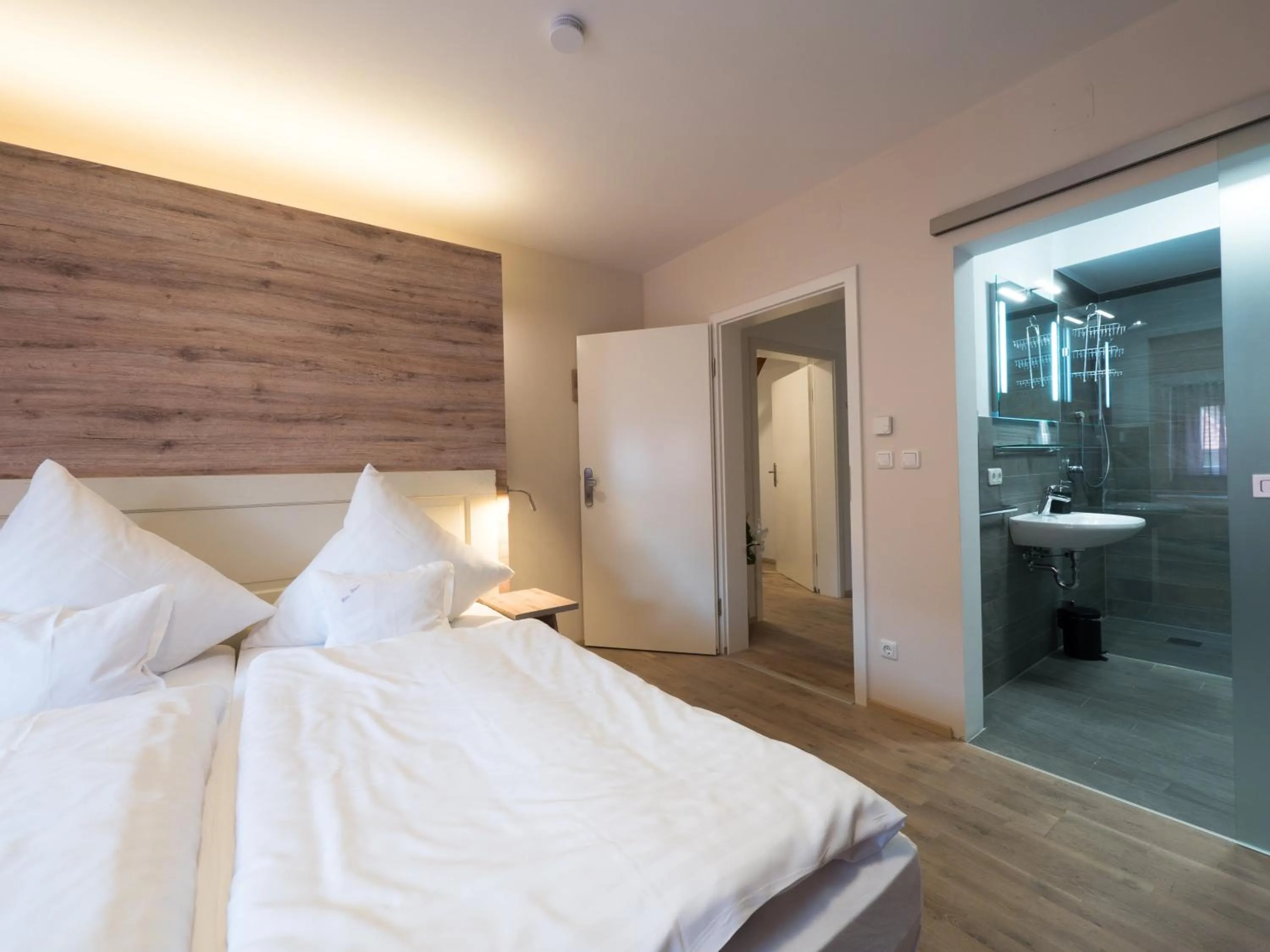 Bed in Hotel - Weinbar FAHR AWAY