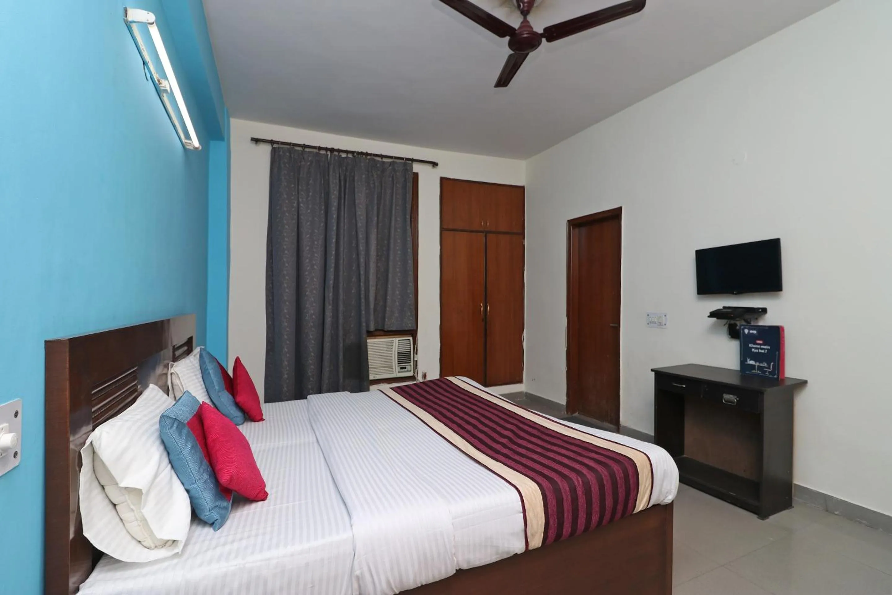 Bed in Hotel Akash Palace