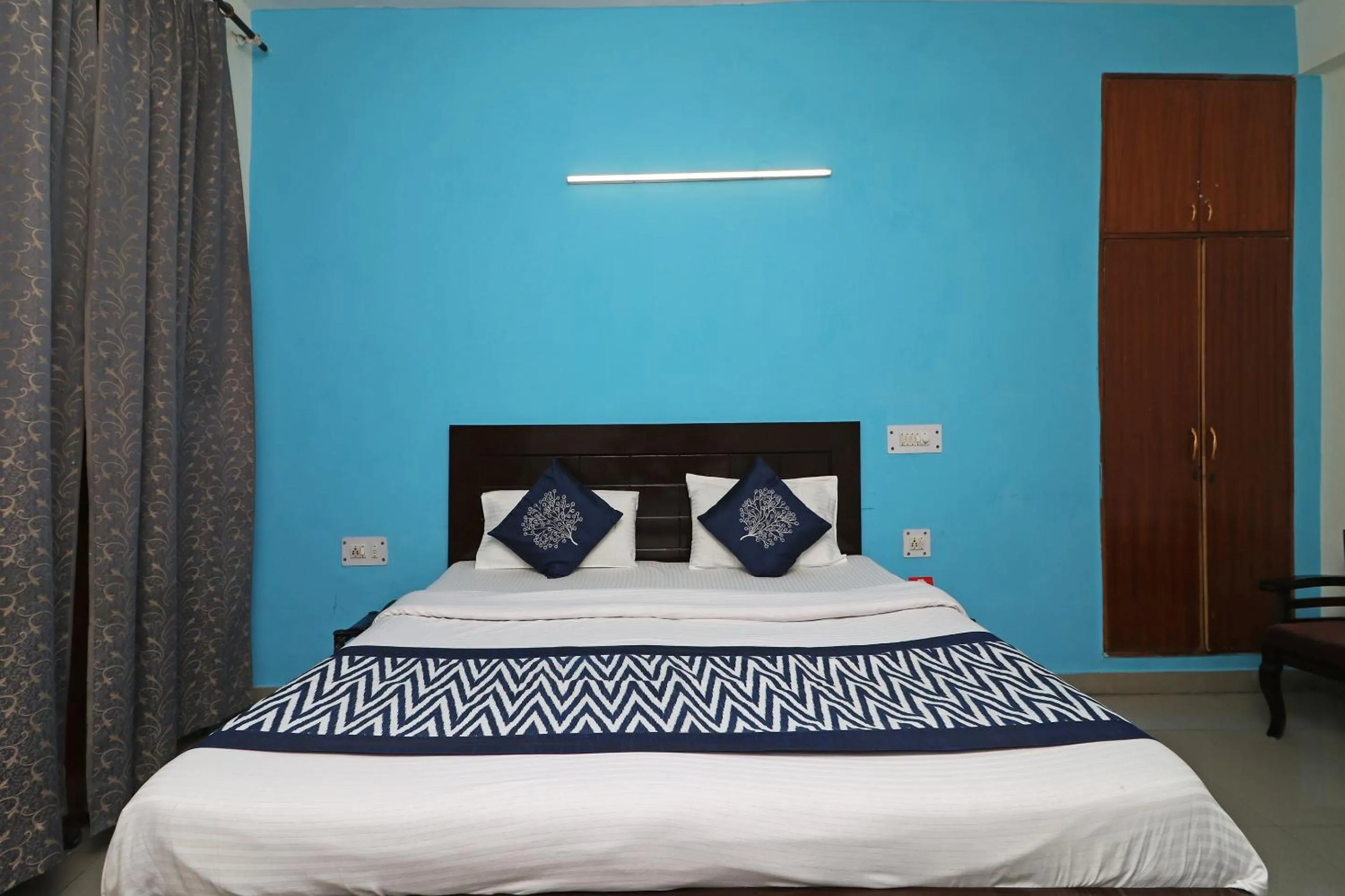 Bed in Hotel Akash Palace