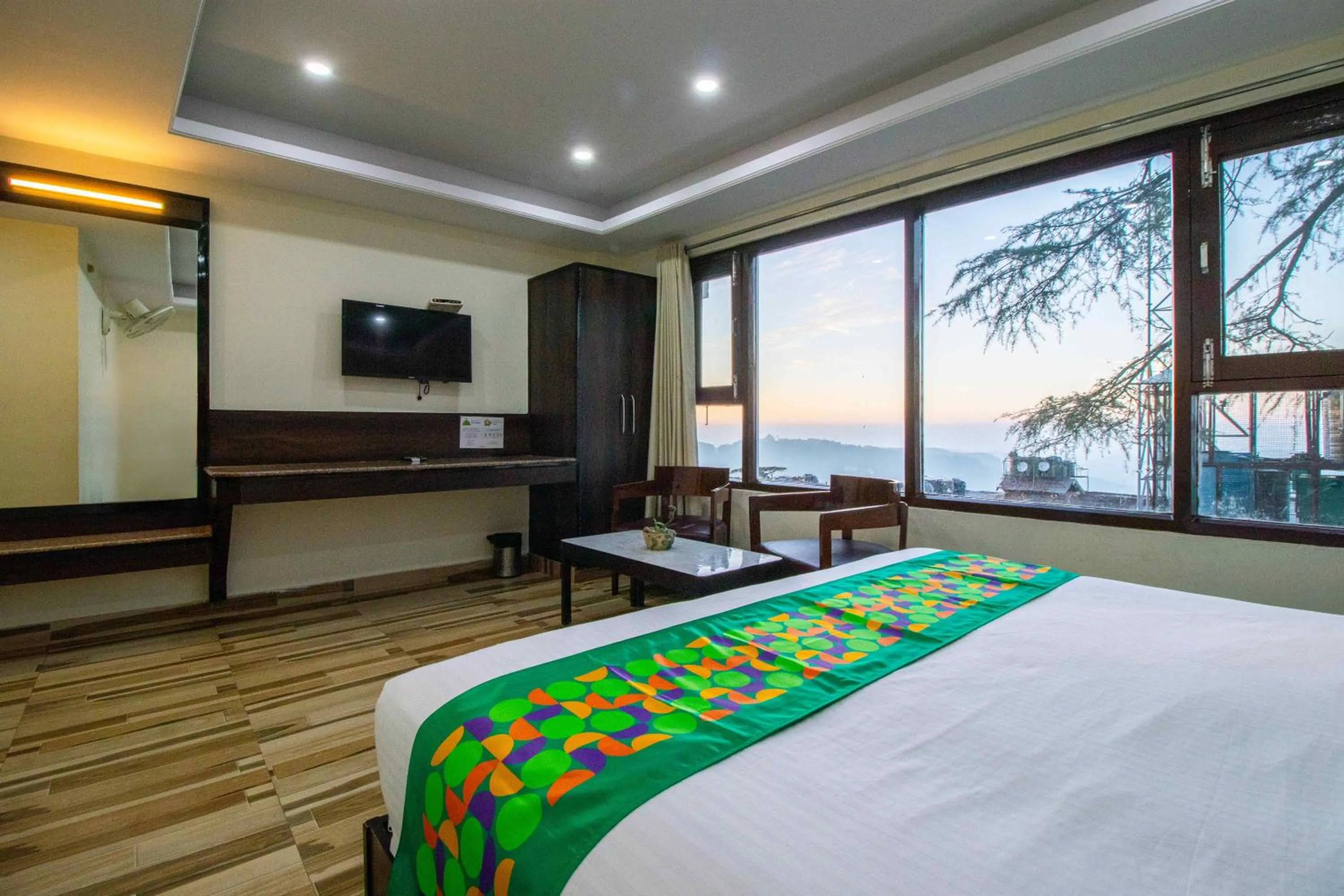 Bedroom, Bed in Treebo Maharaja, Near Mall Road