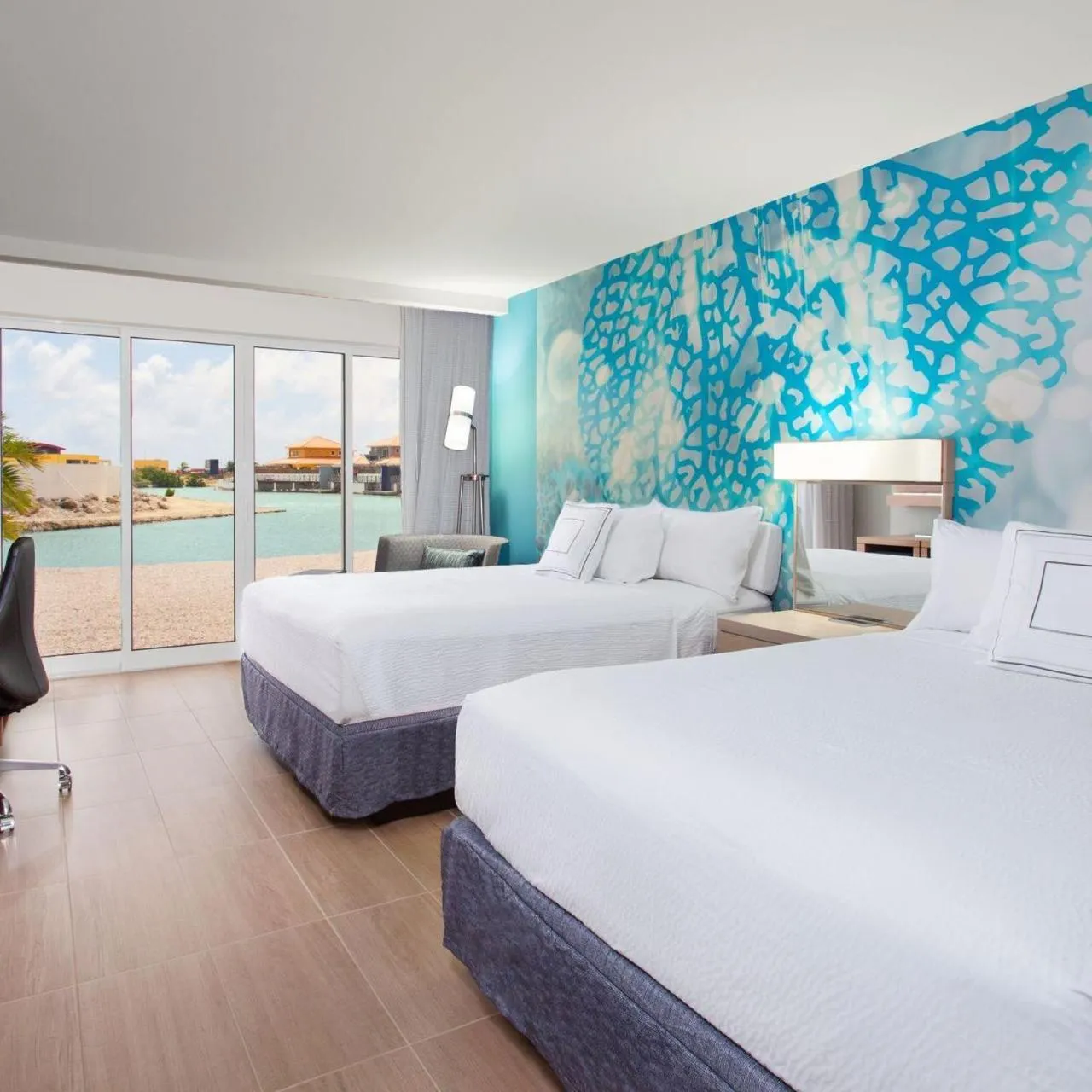 Bed in Corallium Hotel & Villas Bonaire