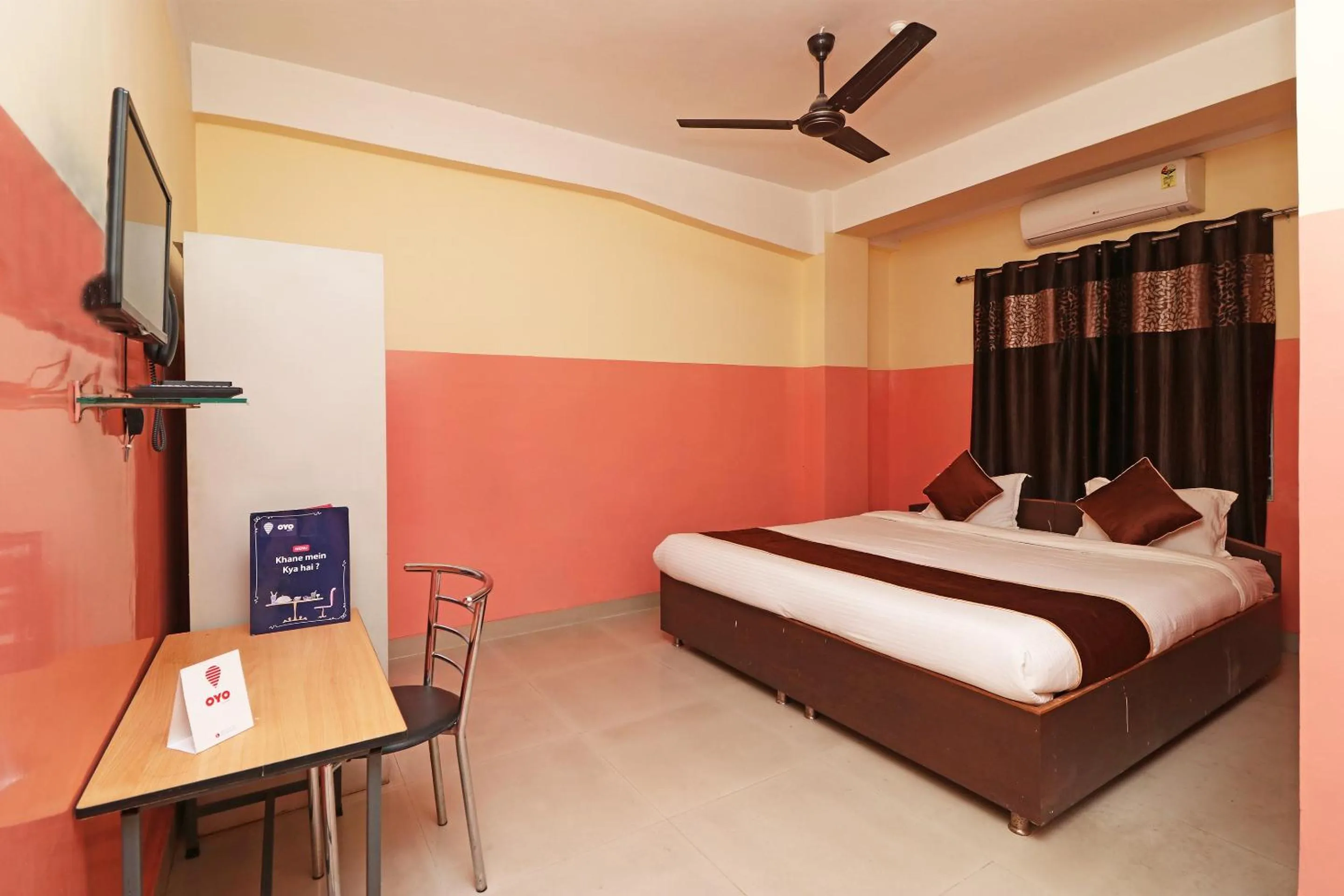 Bedroom in Hotel O Prabha Palace Lodge