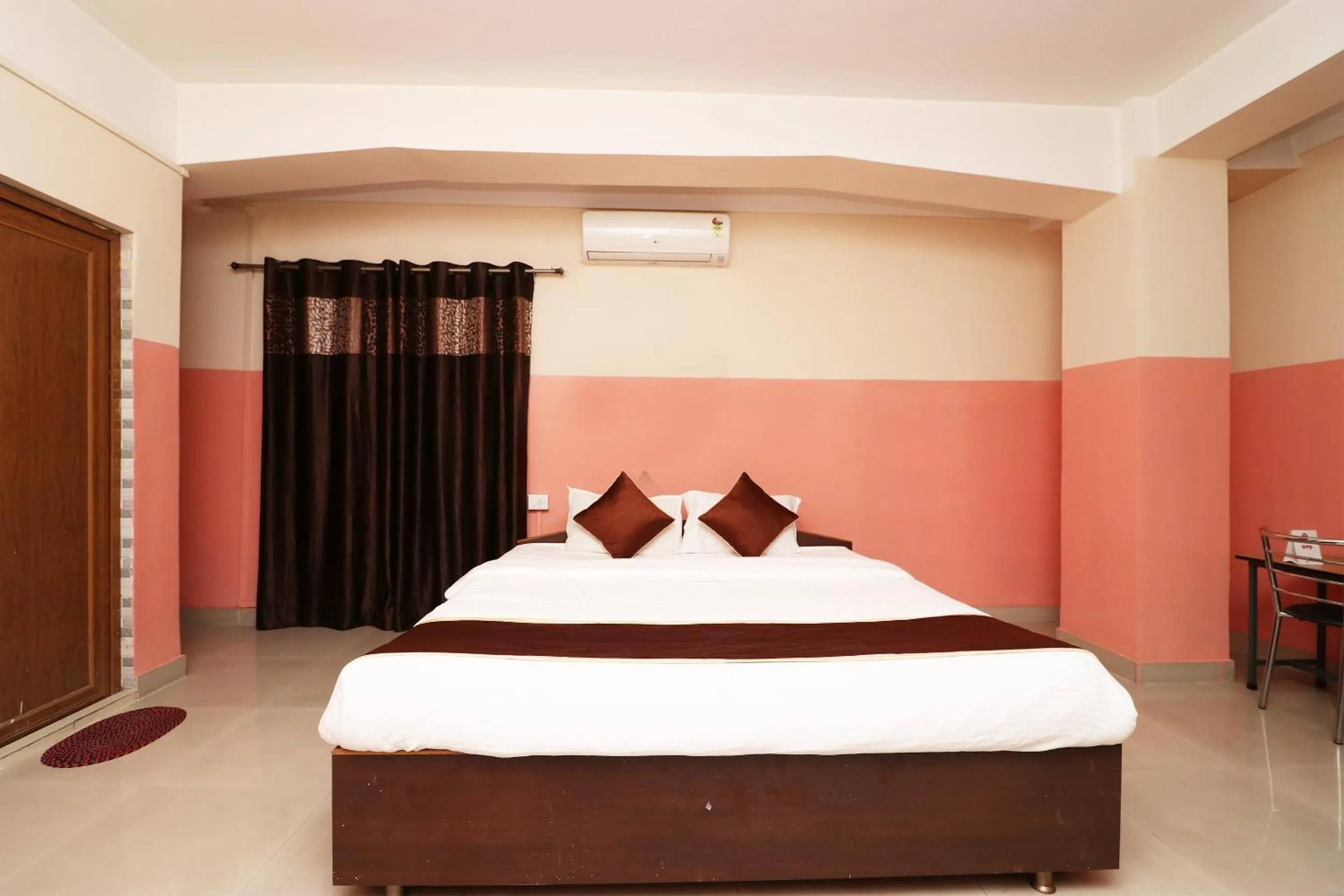 Bedroom in Hotel O Prabha Palace Lodge