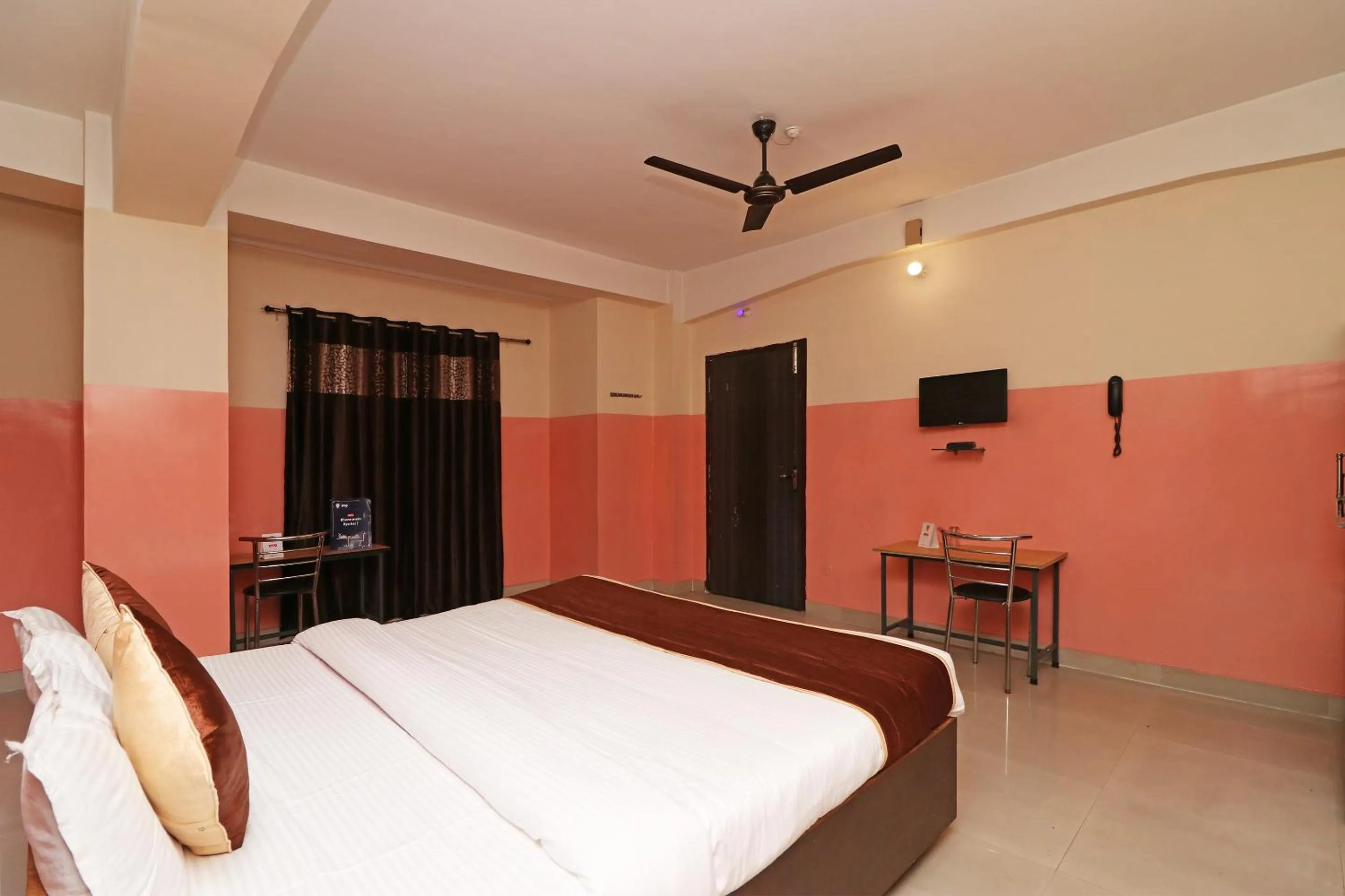 Bedroom in Hotel O Prabha Palace Lodge