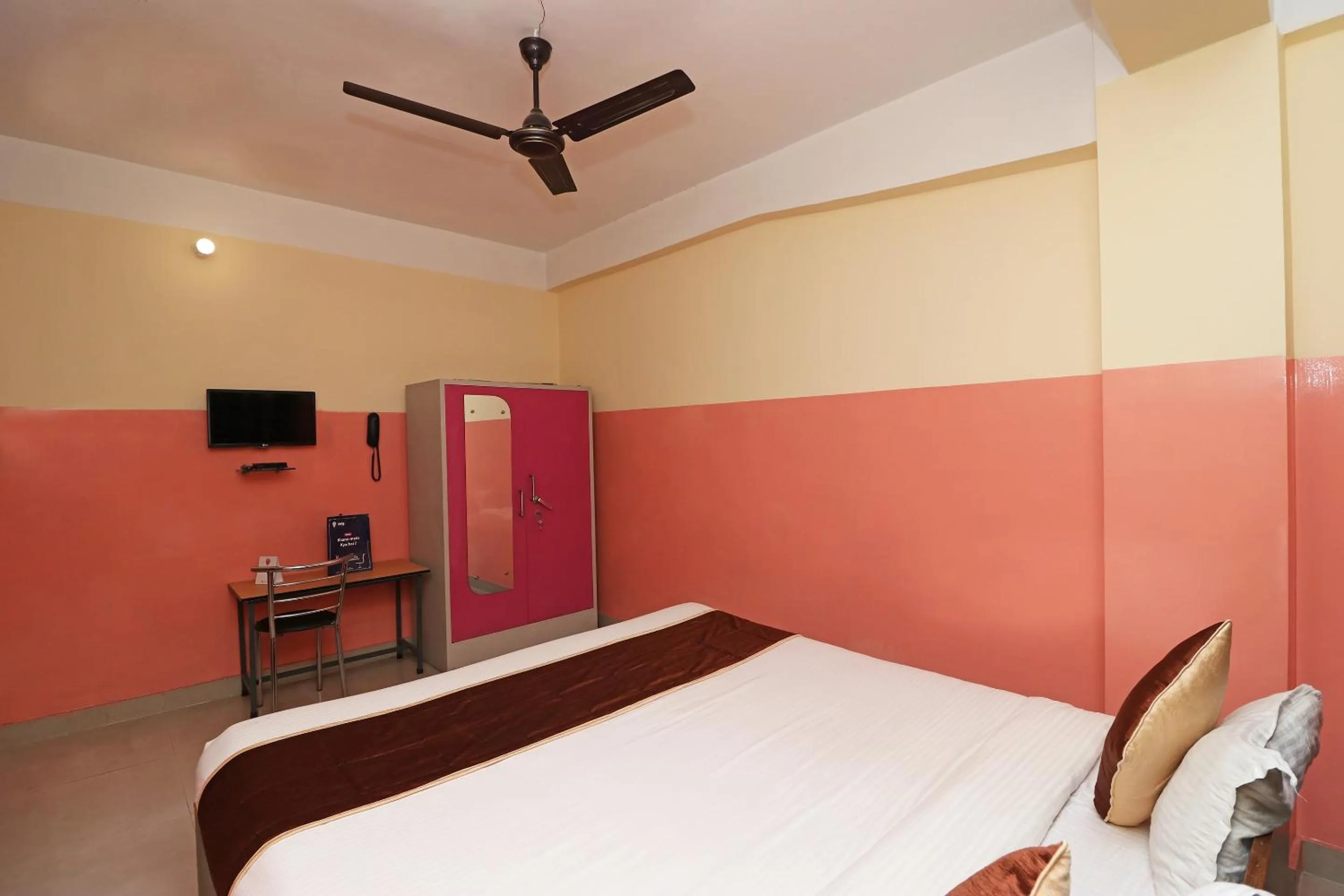 Bedroom in Hotel O Prabha Palace Lodge