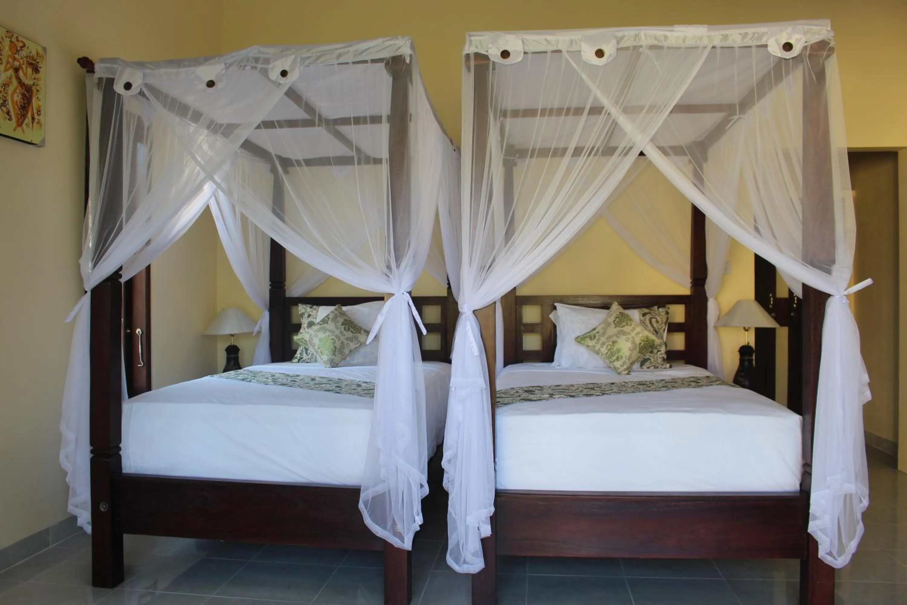 Bed in Bintang Beach Villa
