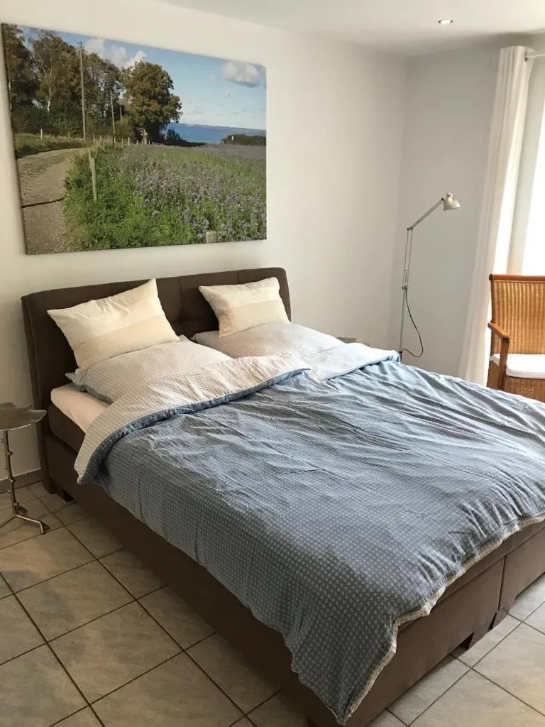 Bed in Ferienwohnung am Mühlenpark