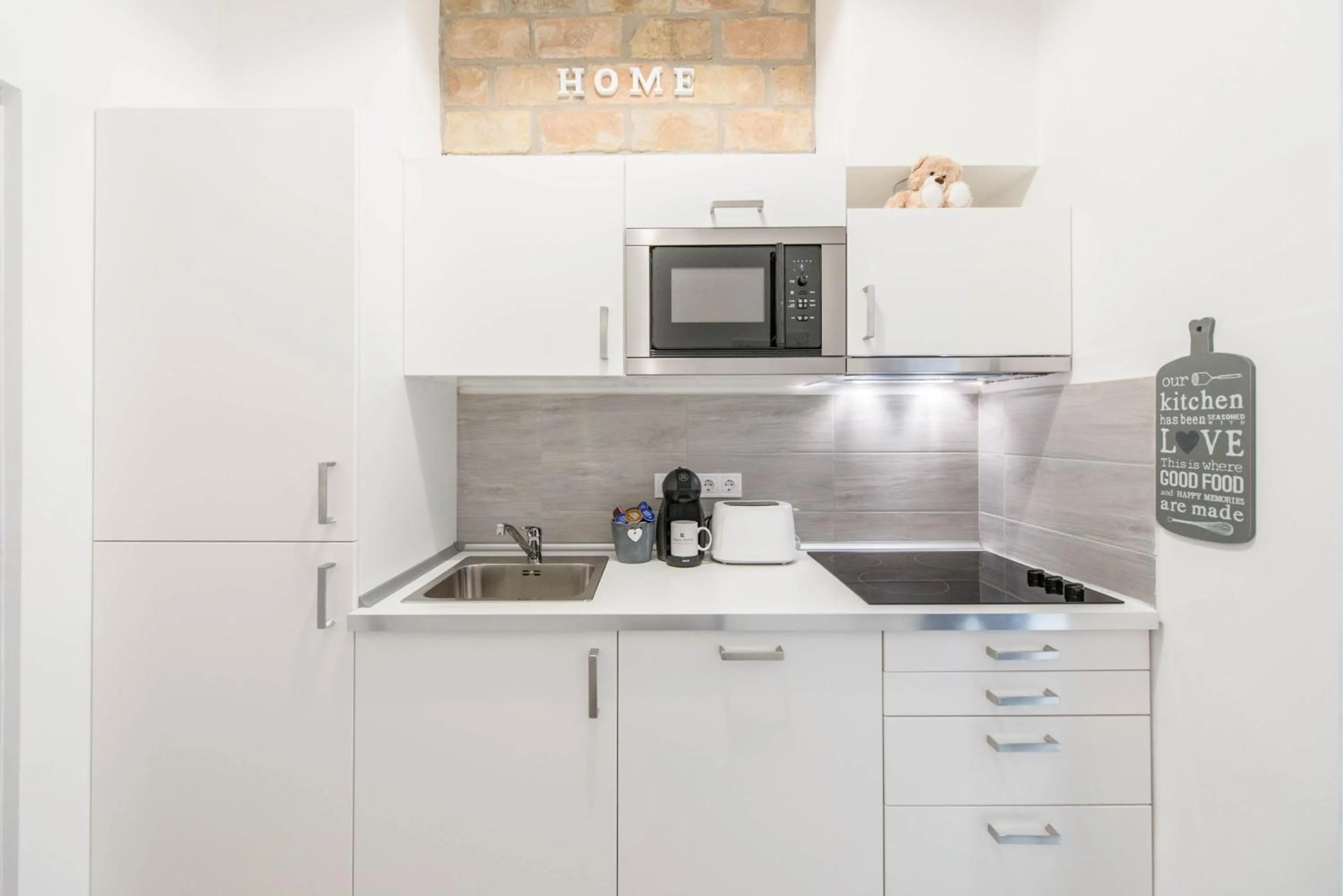 Kitchen or kitchenette in happy home JOY