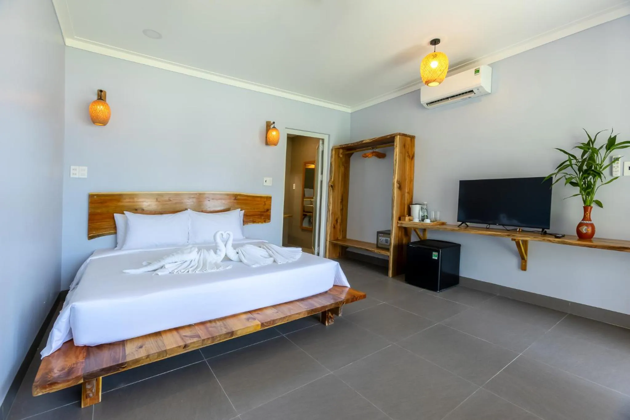 Communal lounge/ TV room, Bed in Cosian Bay Phu Quoc Resort