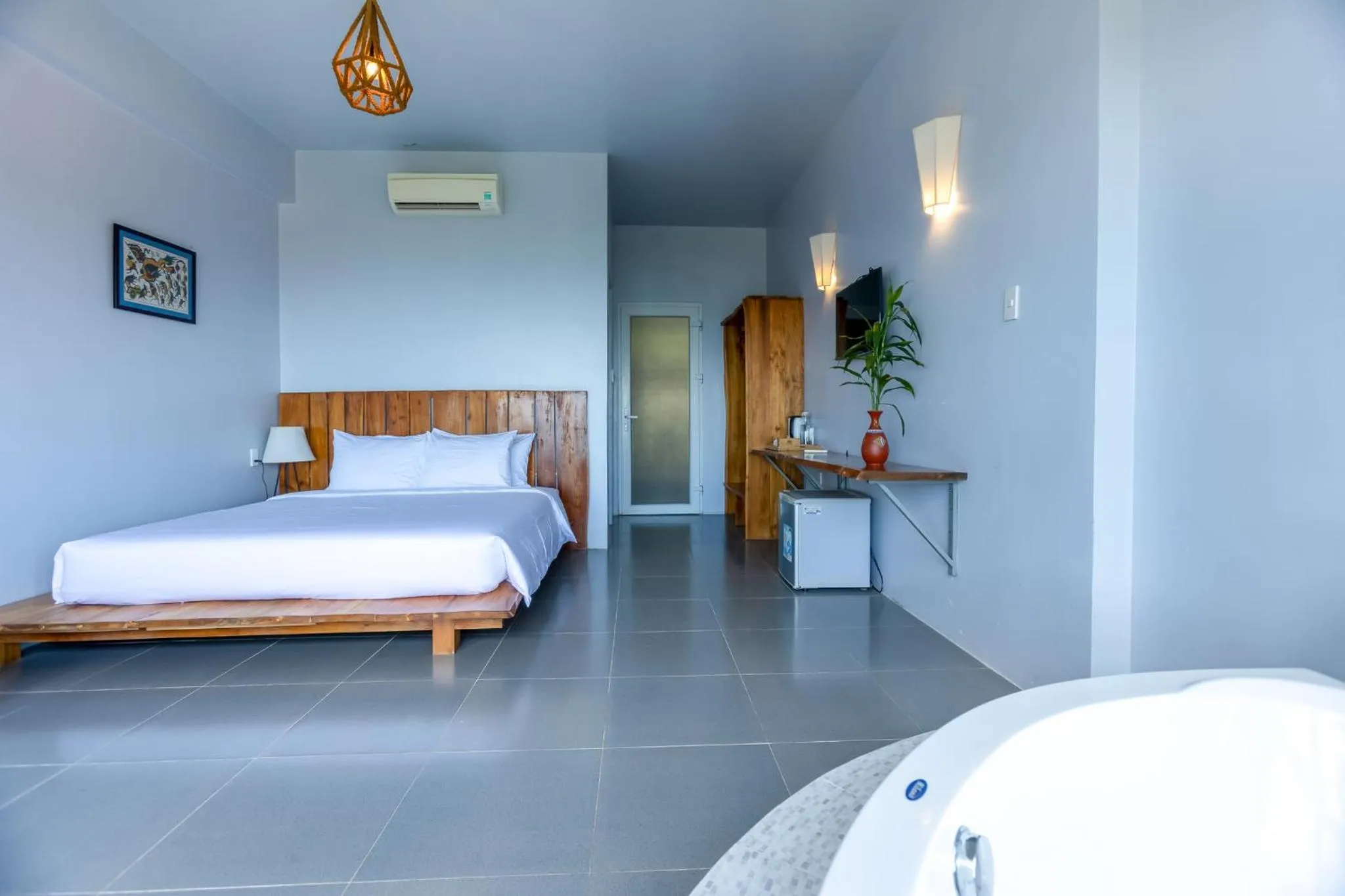 Photo of the whole room, Bed in Cosian Bay Phu Quoc Resort