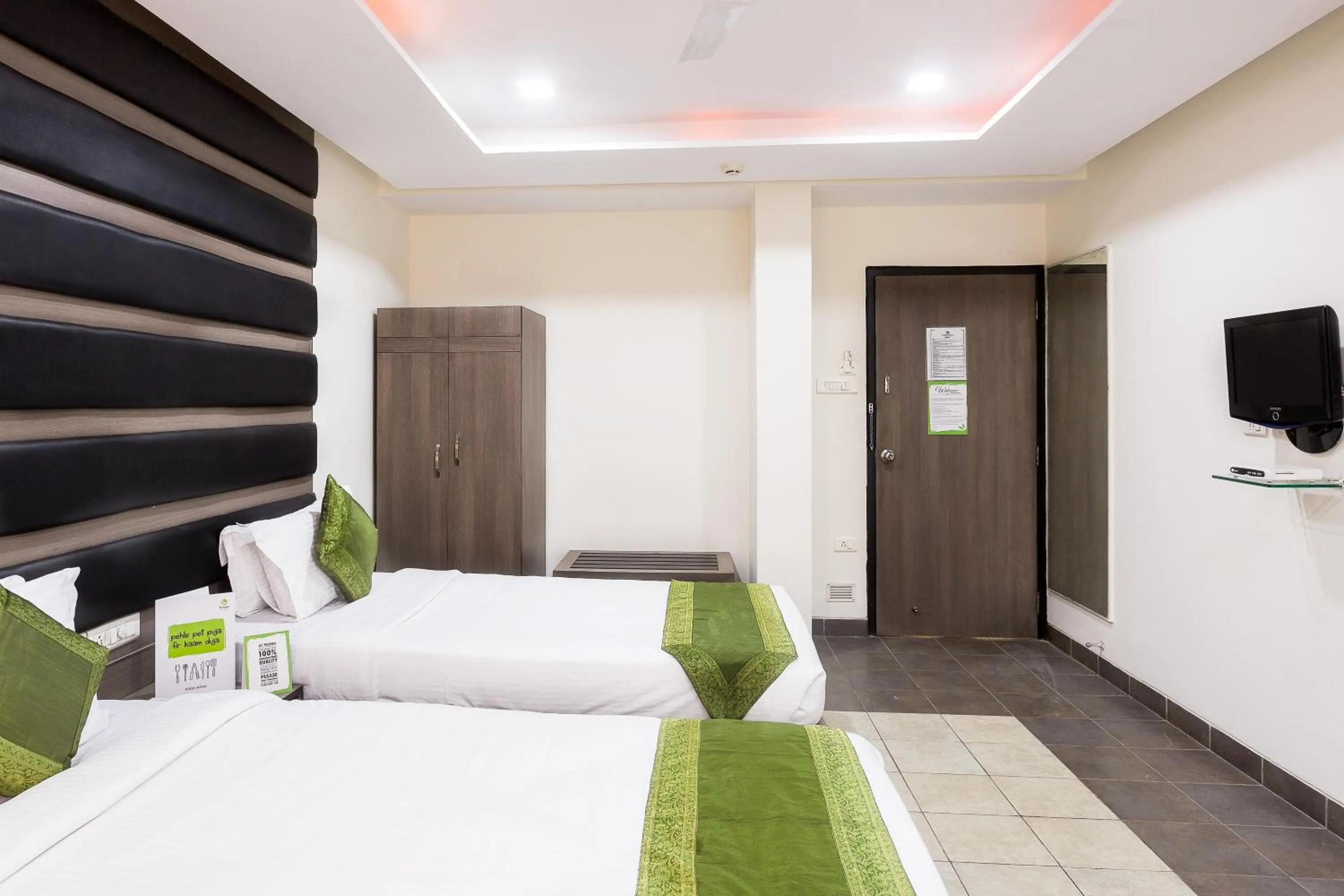 Bedroom, Bed in Treebo Fort Club