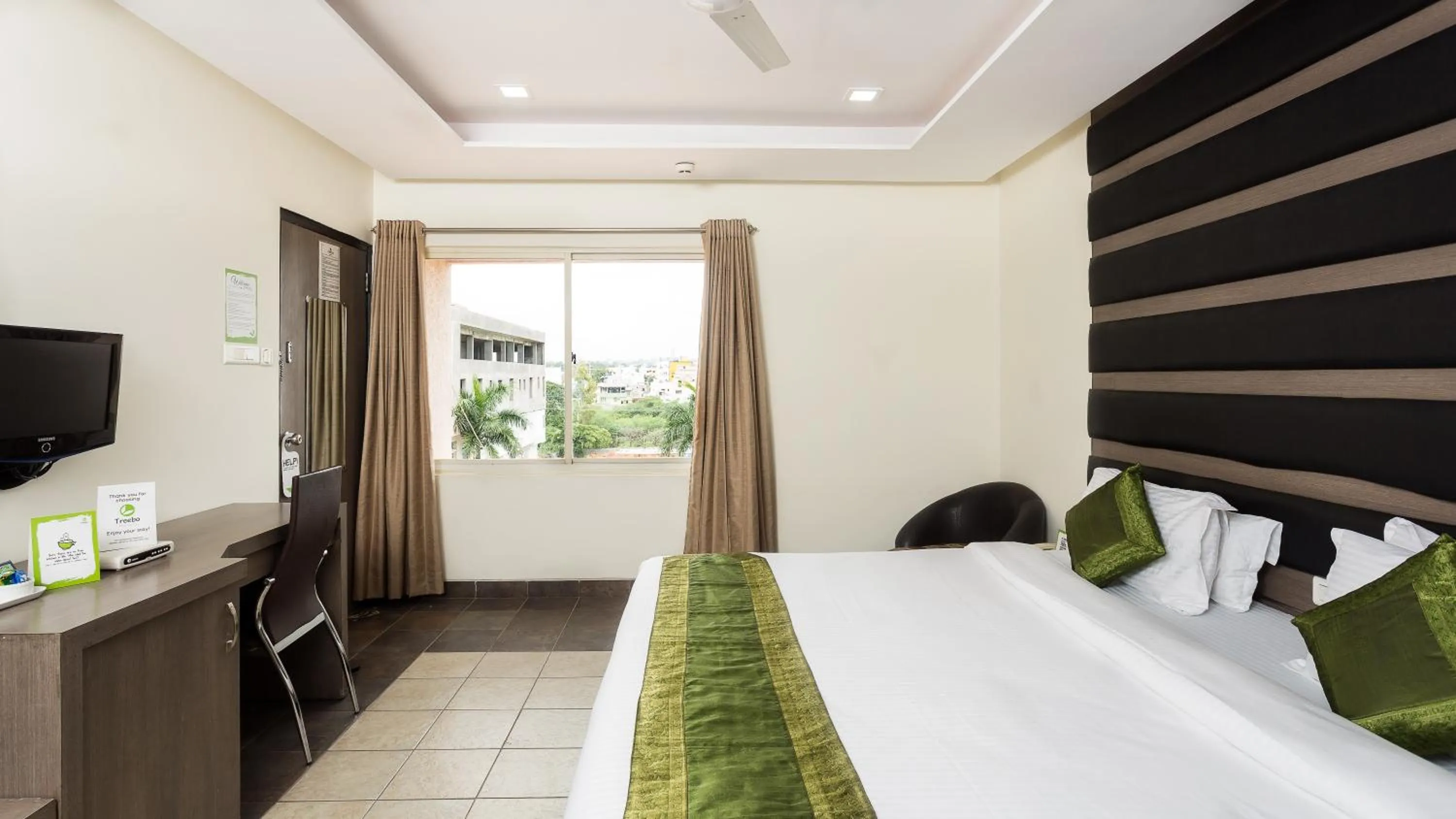 Bedroom, Bed in Treebo Fort Club