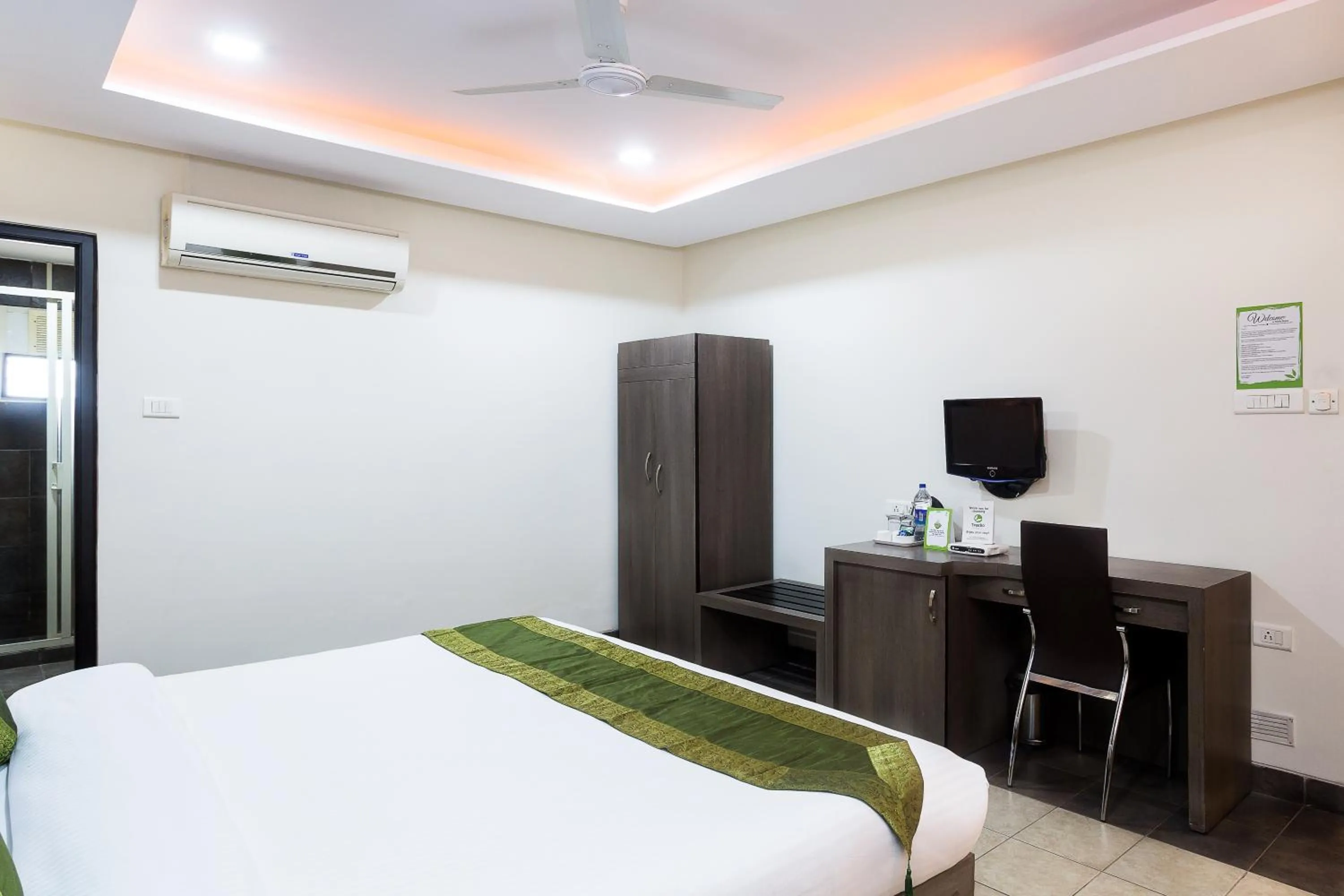 Bedroom, Bed in Treebo Fort Club