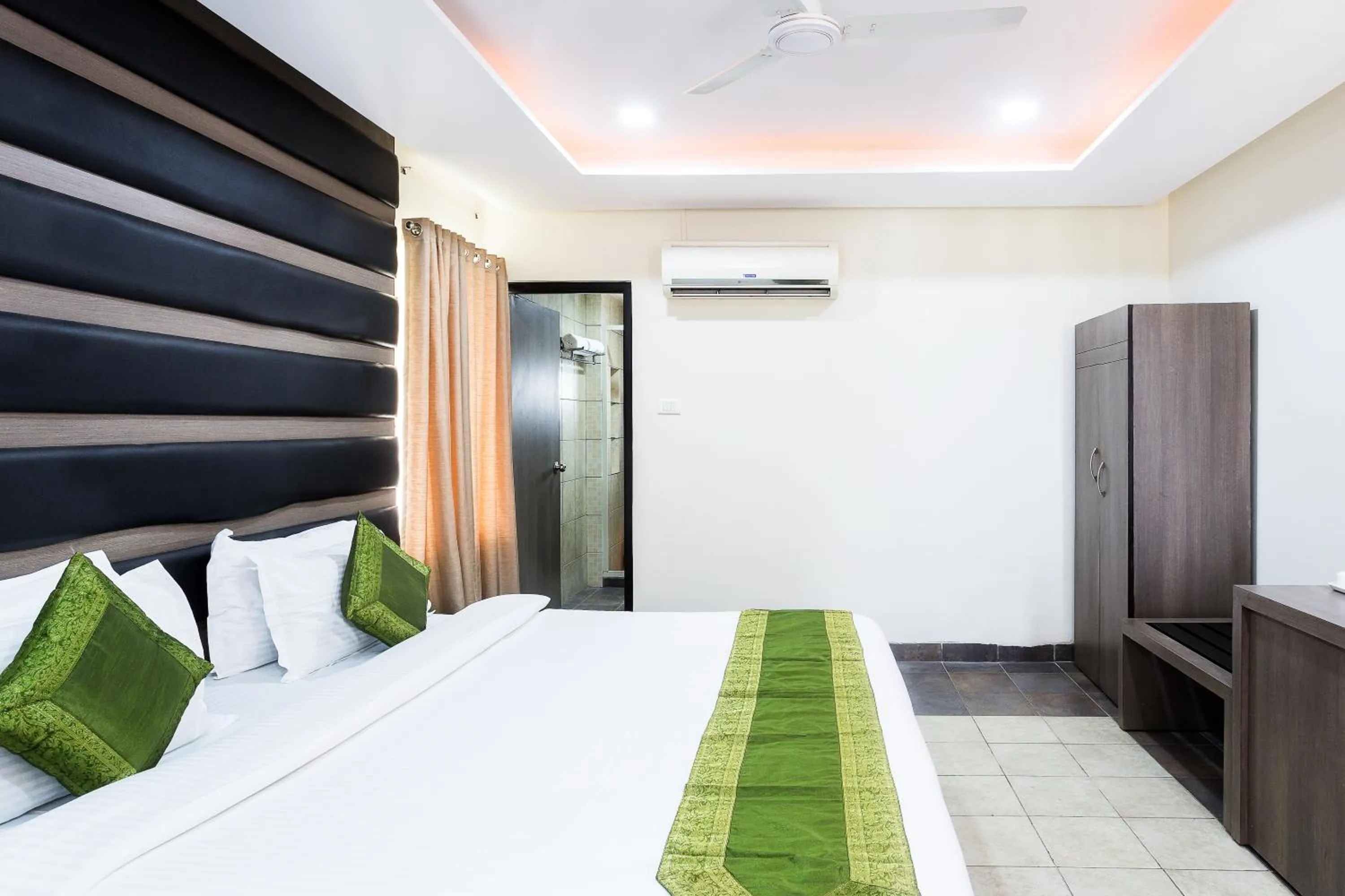 Bedroom, Bed in Treebo Fort Club