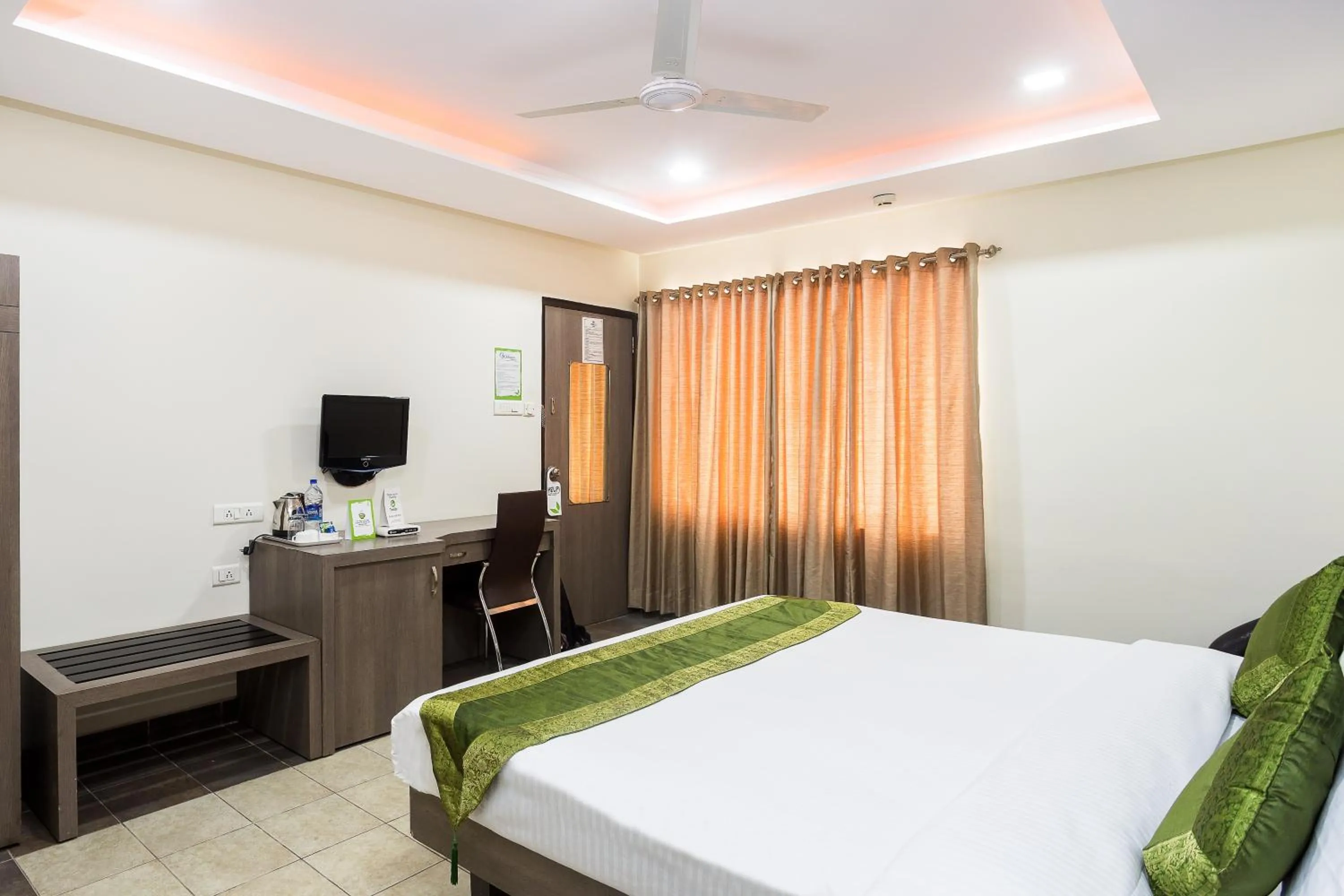 Bedroom, Bed in Treebo Fort Club