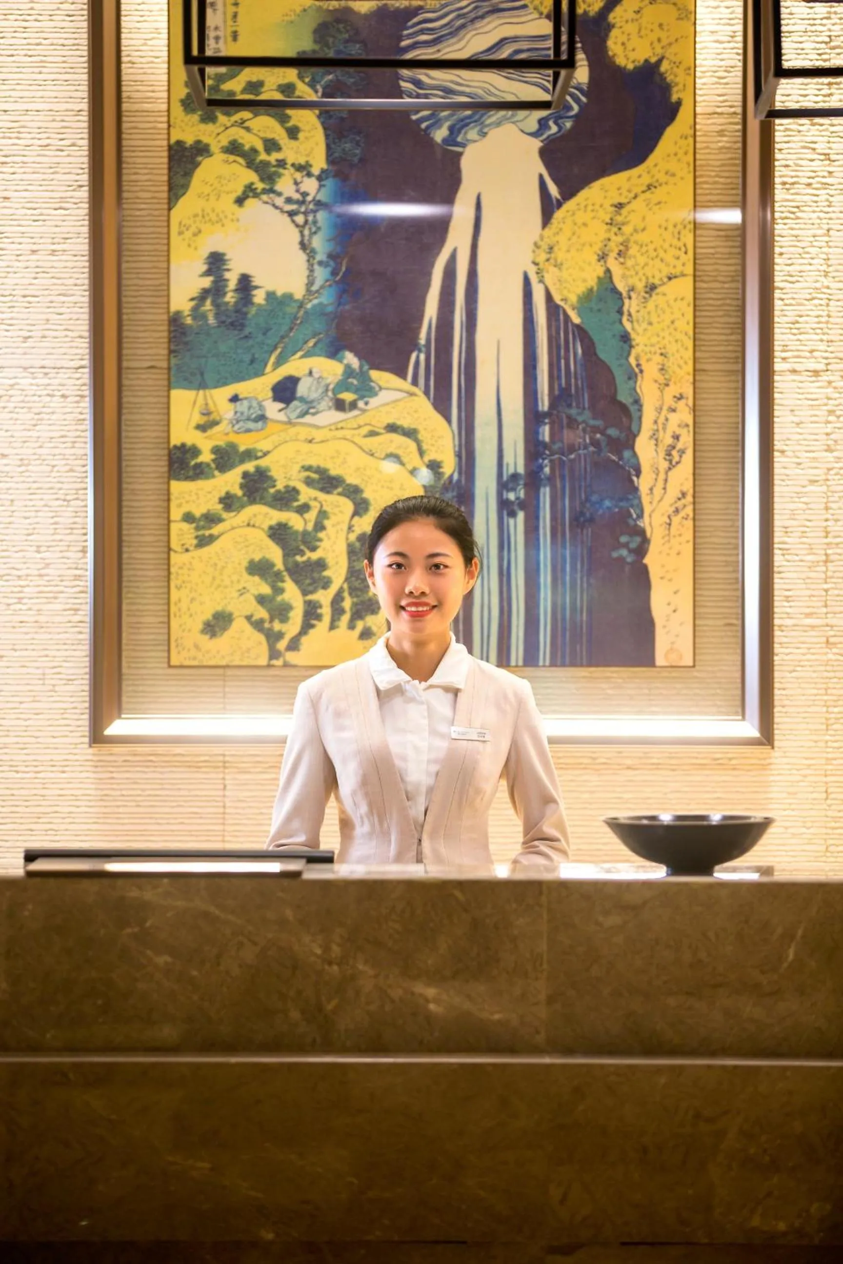 Staff in Wyndham Grand Plaza Royale Wenchang