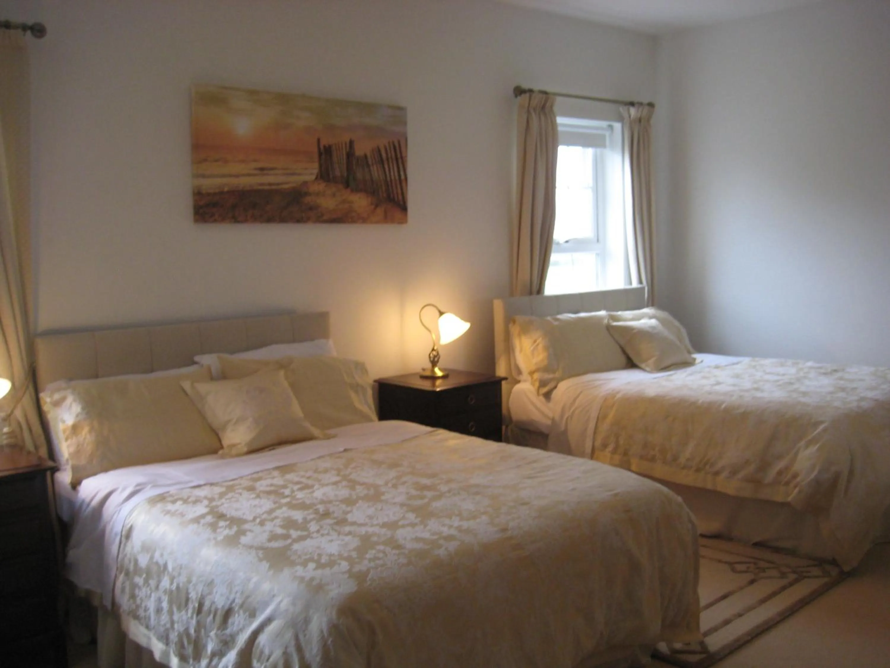 Bed in Drumspittal House Guest Accomodation