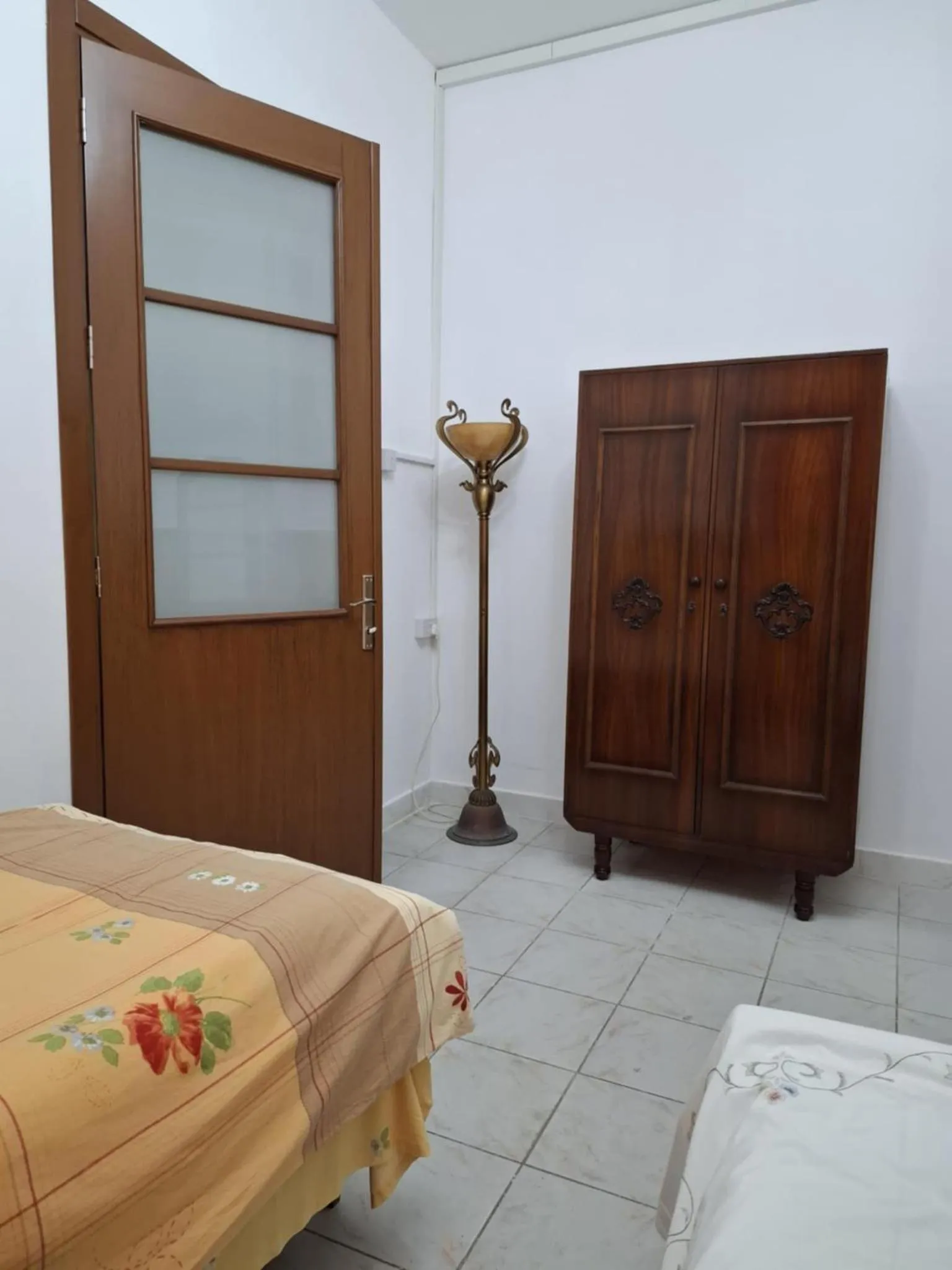 Bed in Mystery Garden Guest House