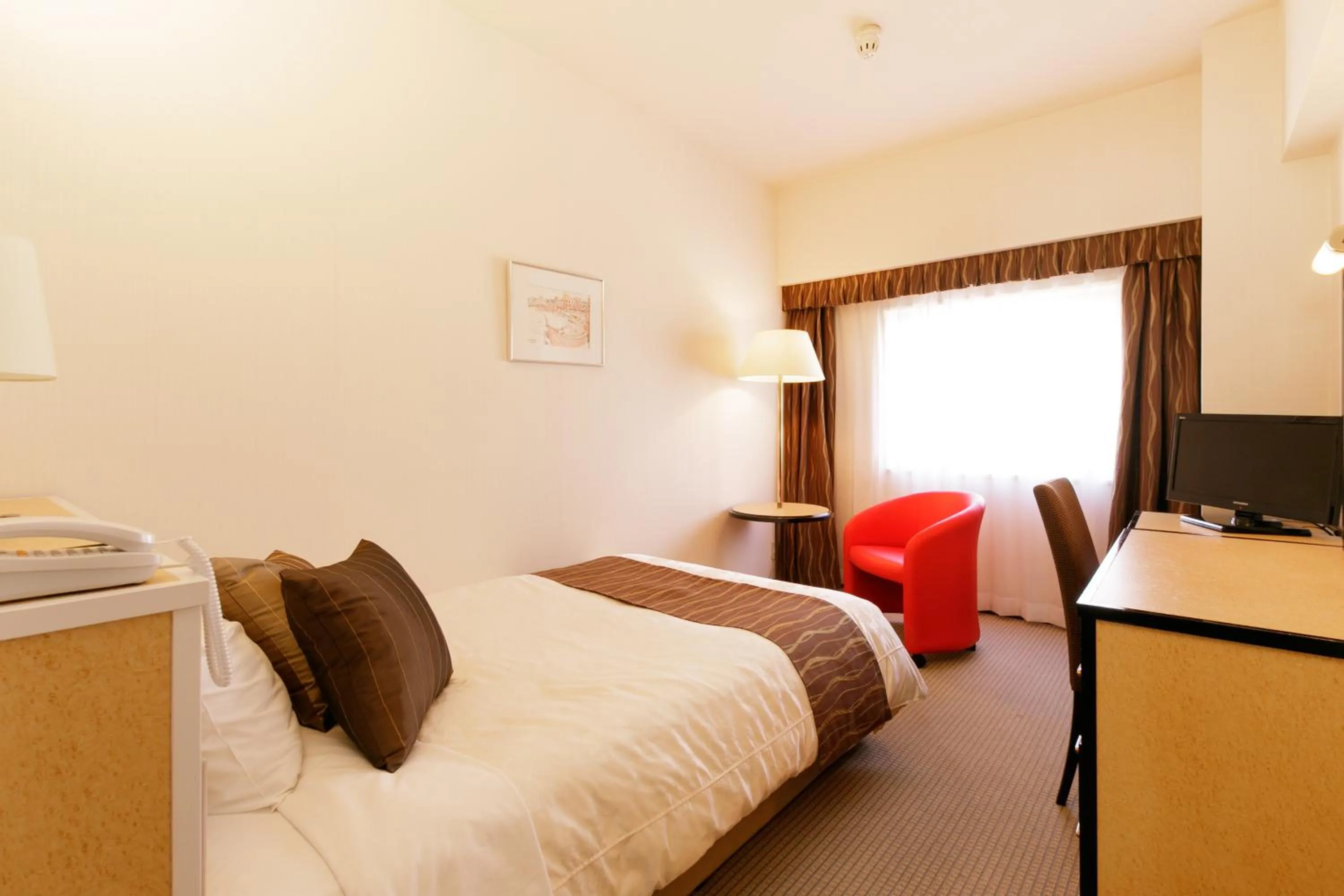 Photo of the whole room, Bed in The Celecton Fukushima