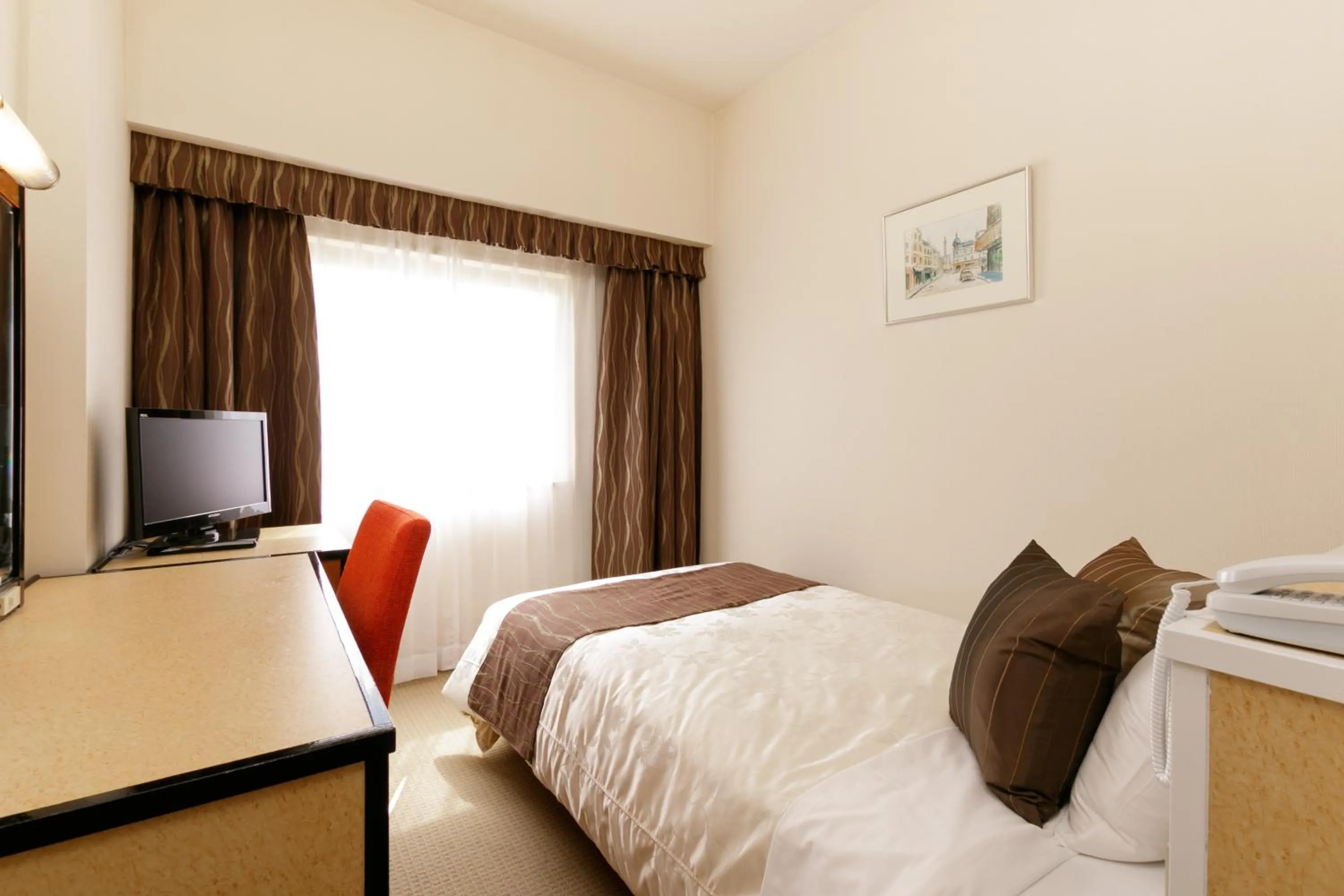 Photo of the whole room, Bed in The Celecton Fukushima