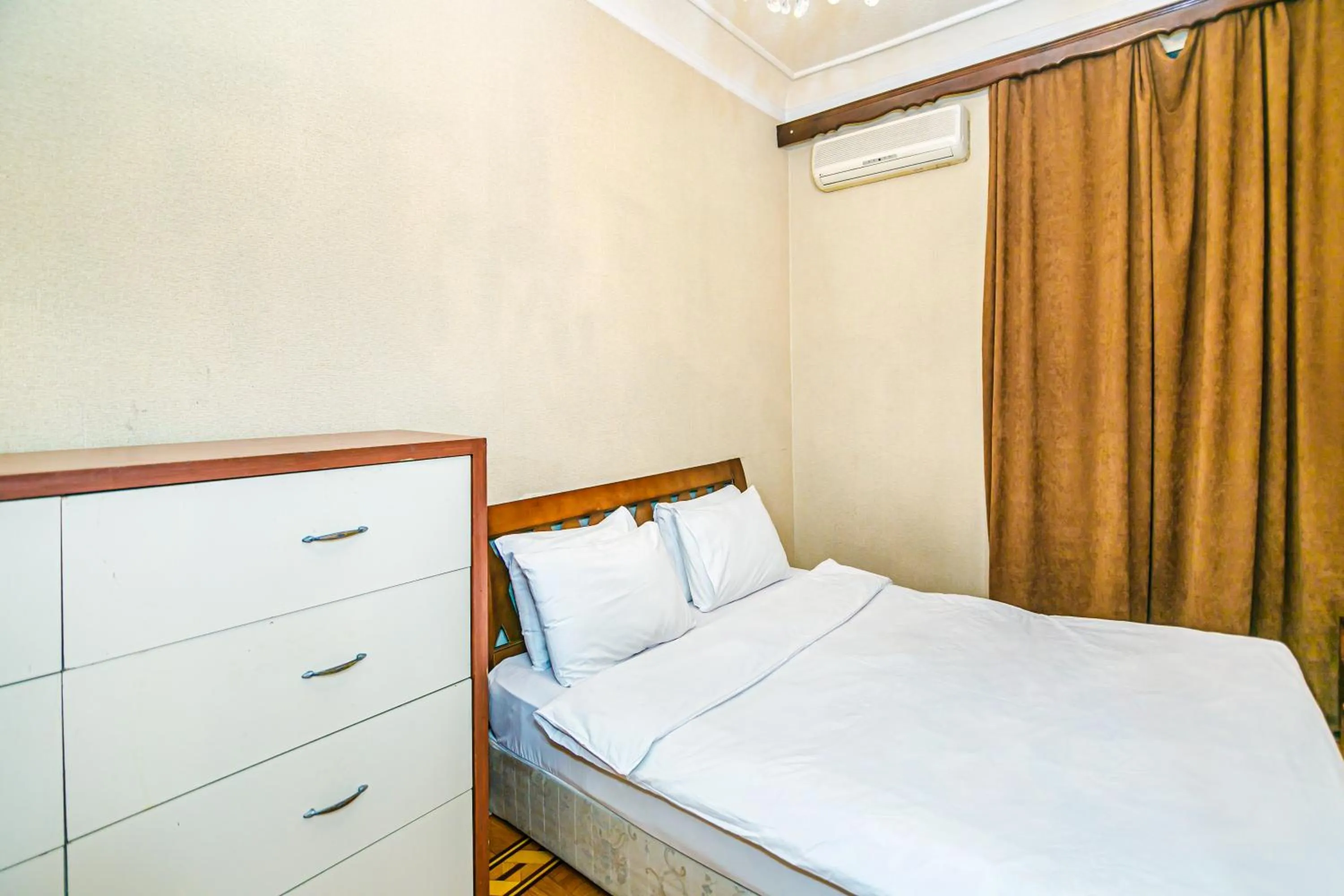 Bedroom in Monolit Apartment