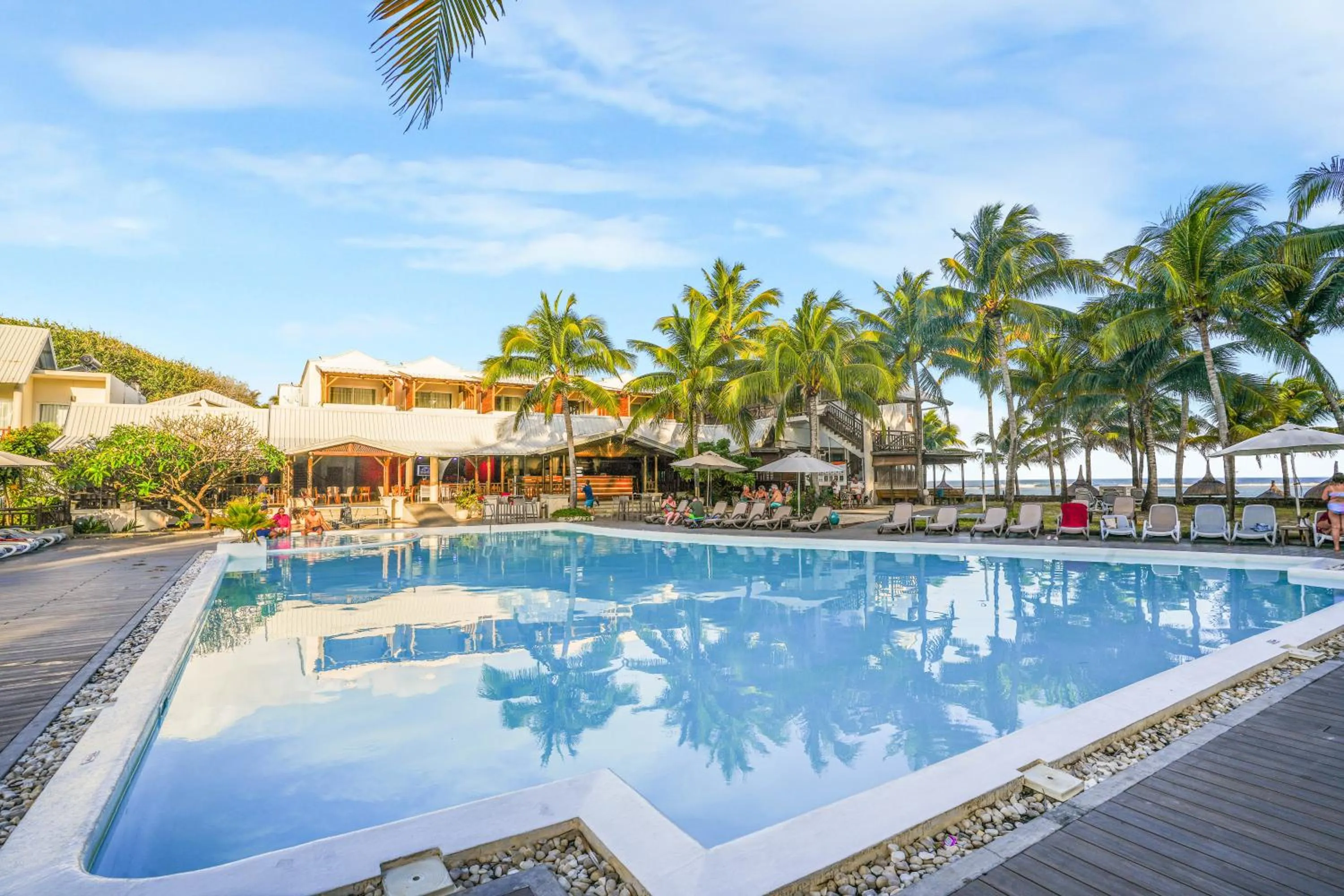 Swimming pool in Le Peninsula Bay Beach Resort & Spa