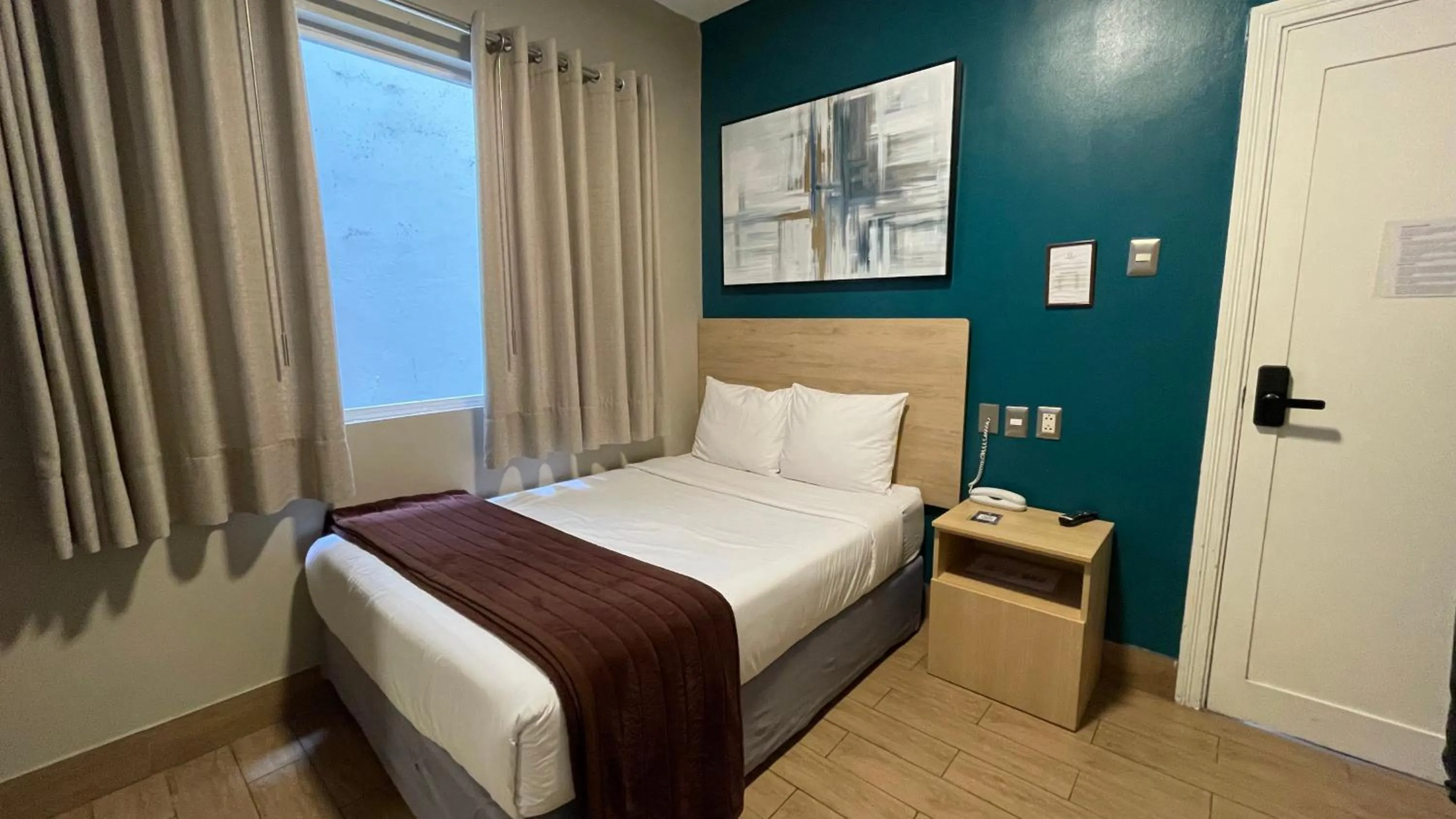 Bed in Residencial Alfa Hotel