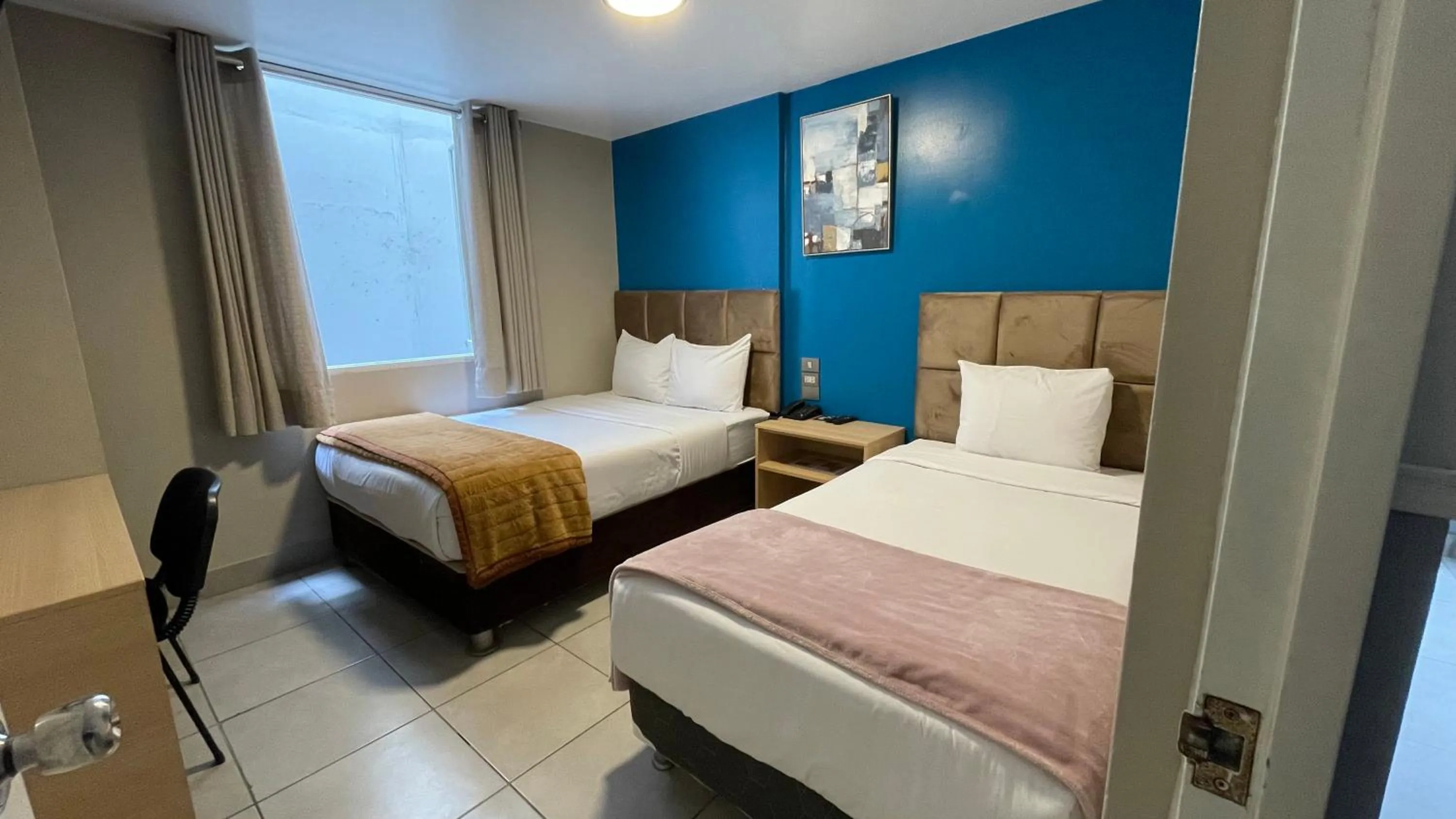 Bed in Residencial Alfa Hotel