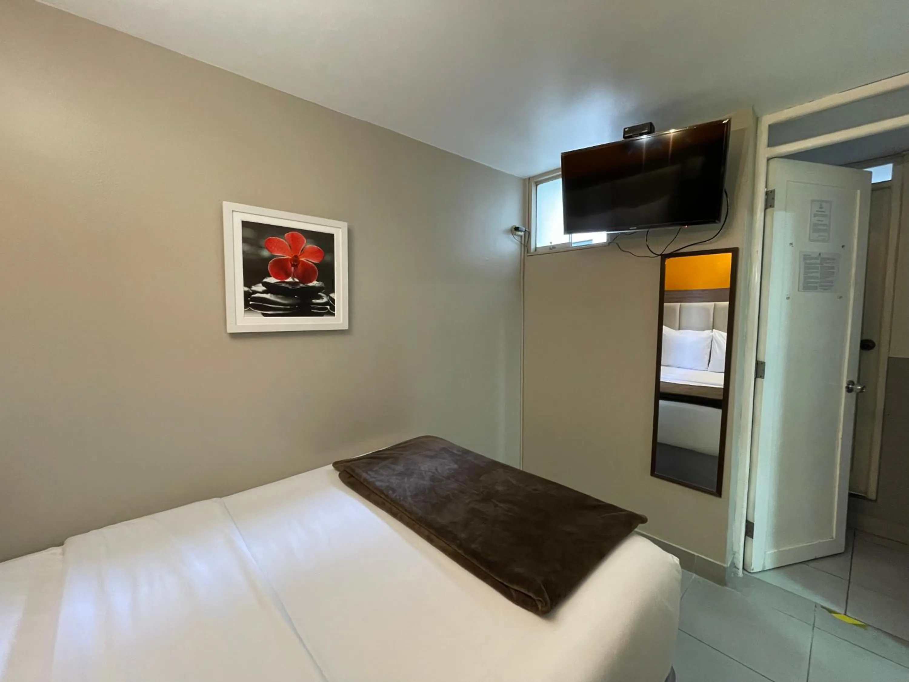 Bed in Residencial Alfa Hotel