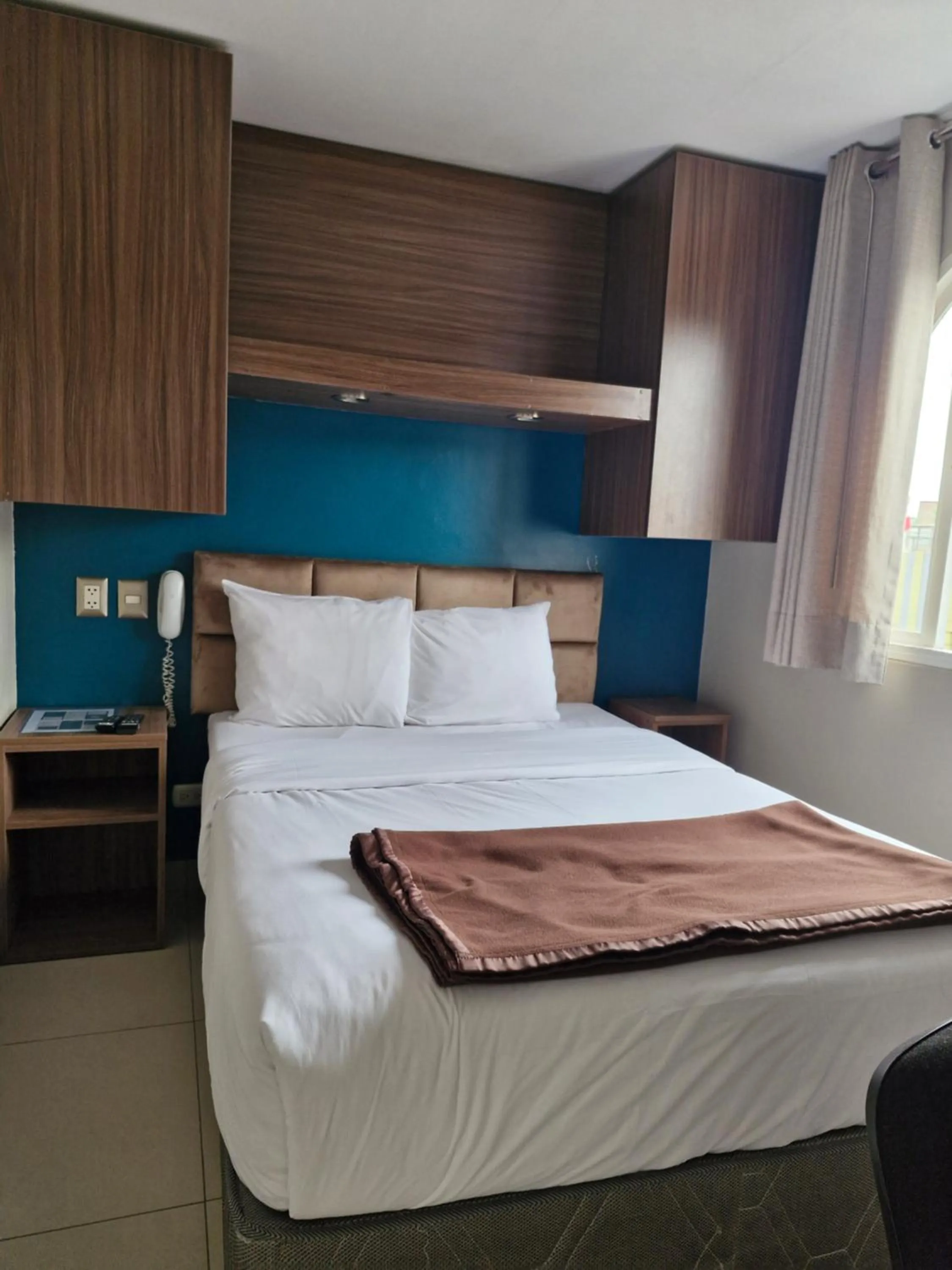 Bed in Residencial Alfa Hotel