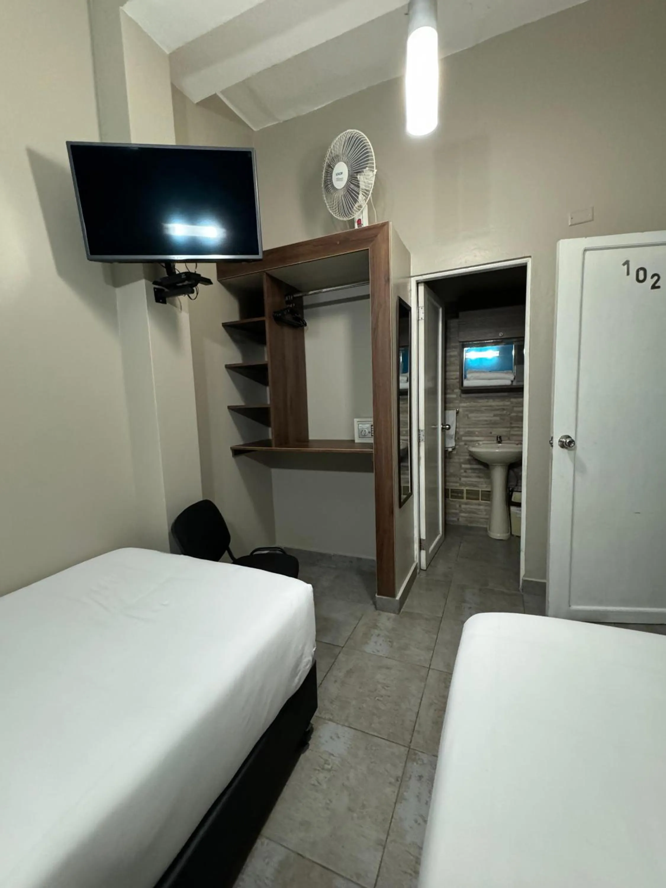 Bed in Residencial Alfa Hotel