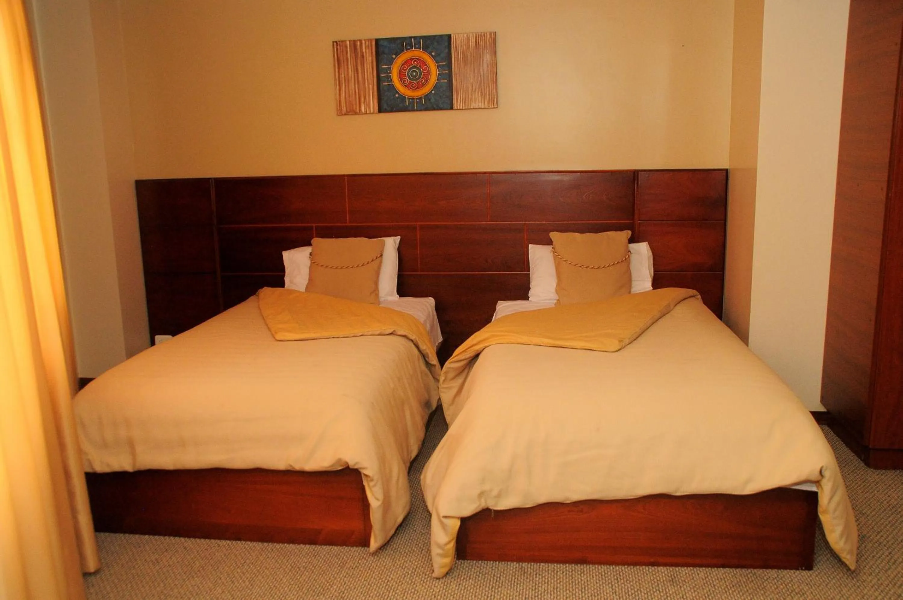 Bedroom, Bed in Colony Inn Hotel