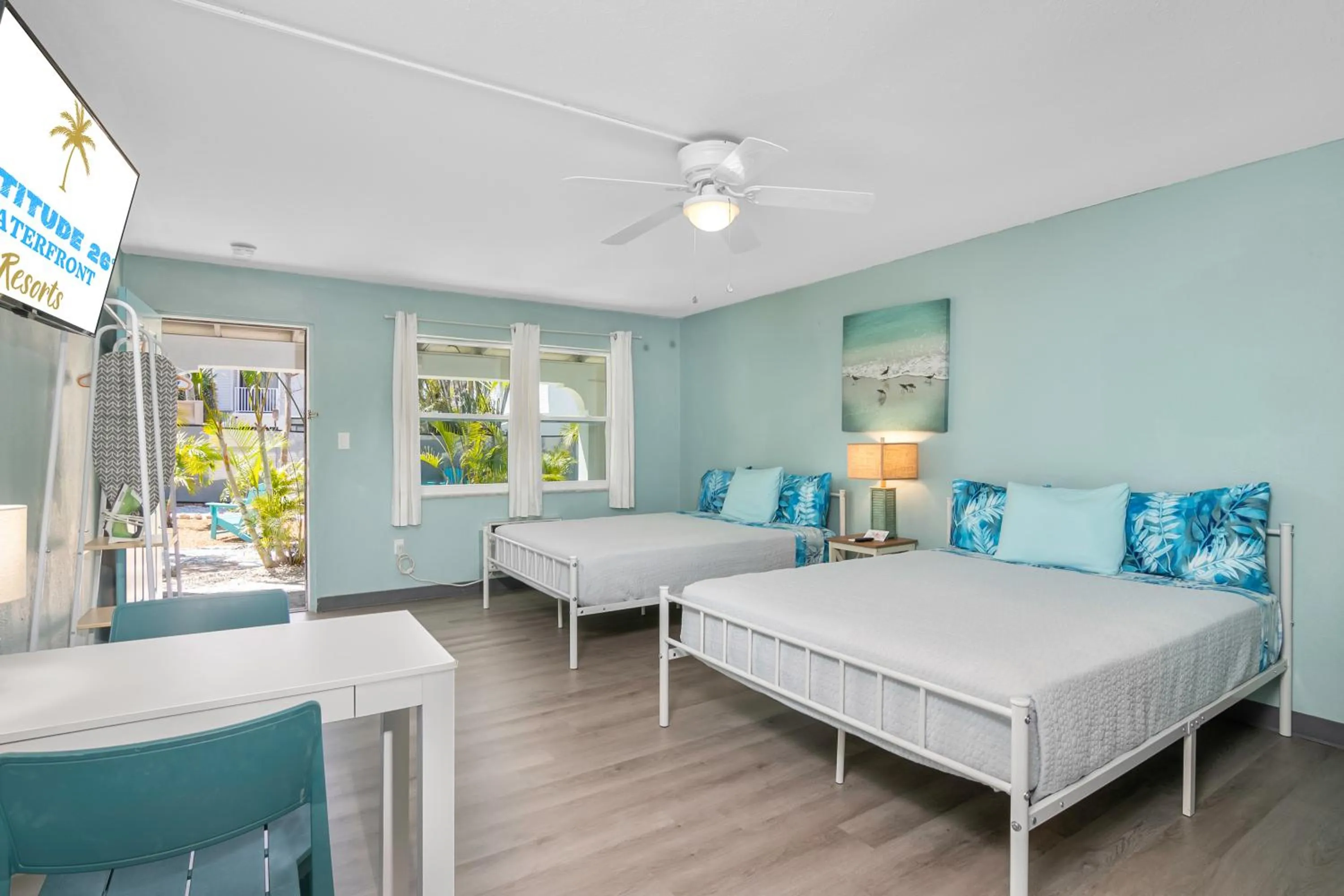 Photo of the whole room, Bed in Latitude 26 Waterfront Boutique Resort - Fort Myers Beach
