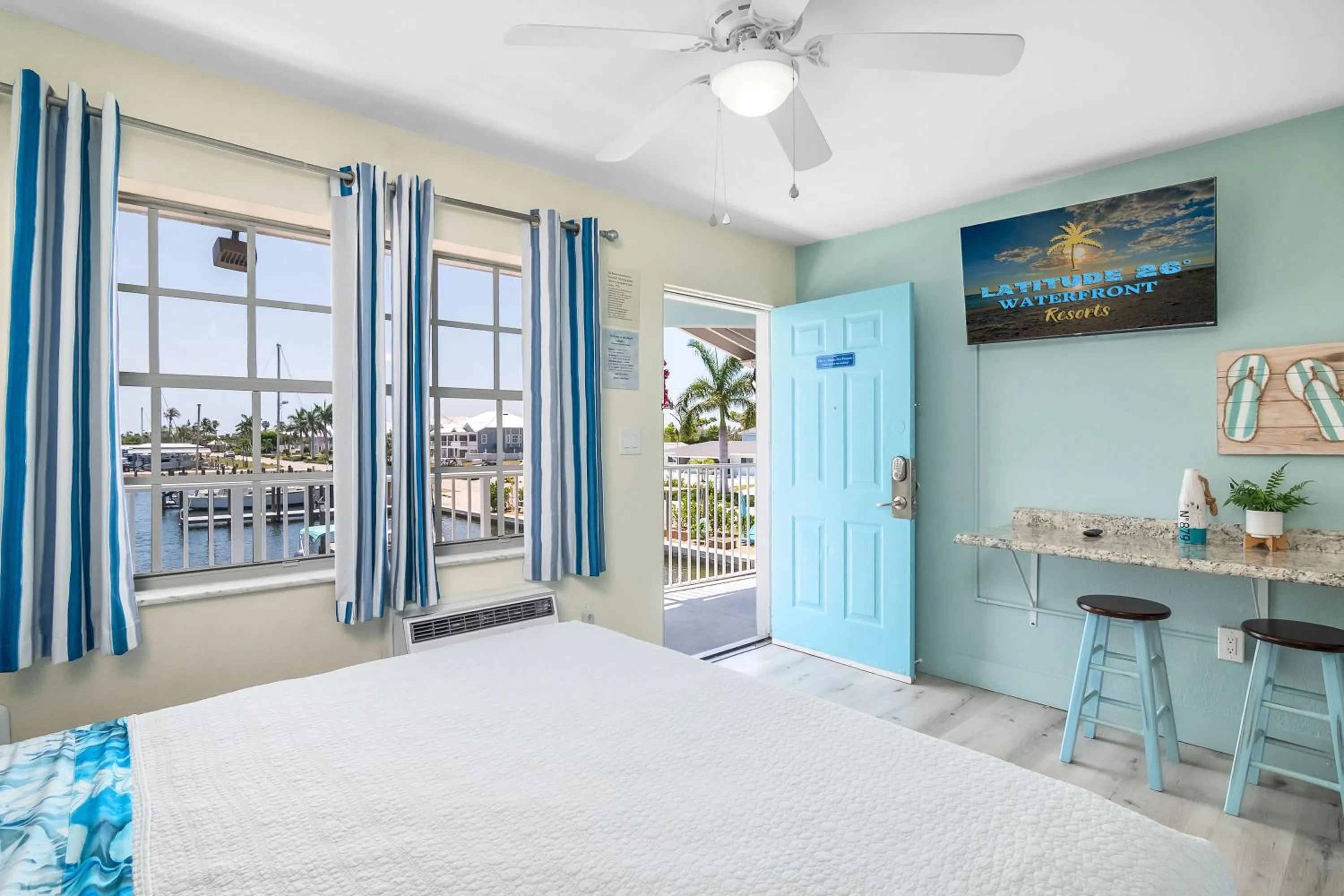 Bed in Latitude 26 Waterfront Boutique Resort - Fort Myers Beach