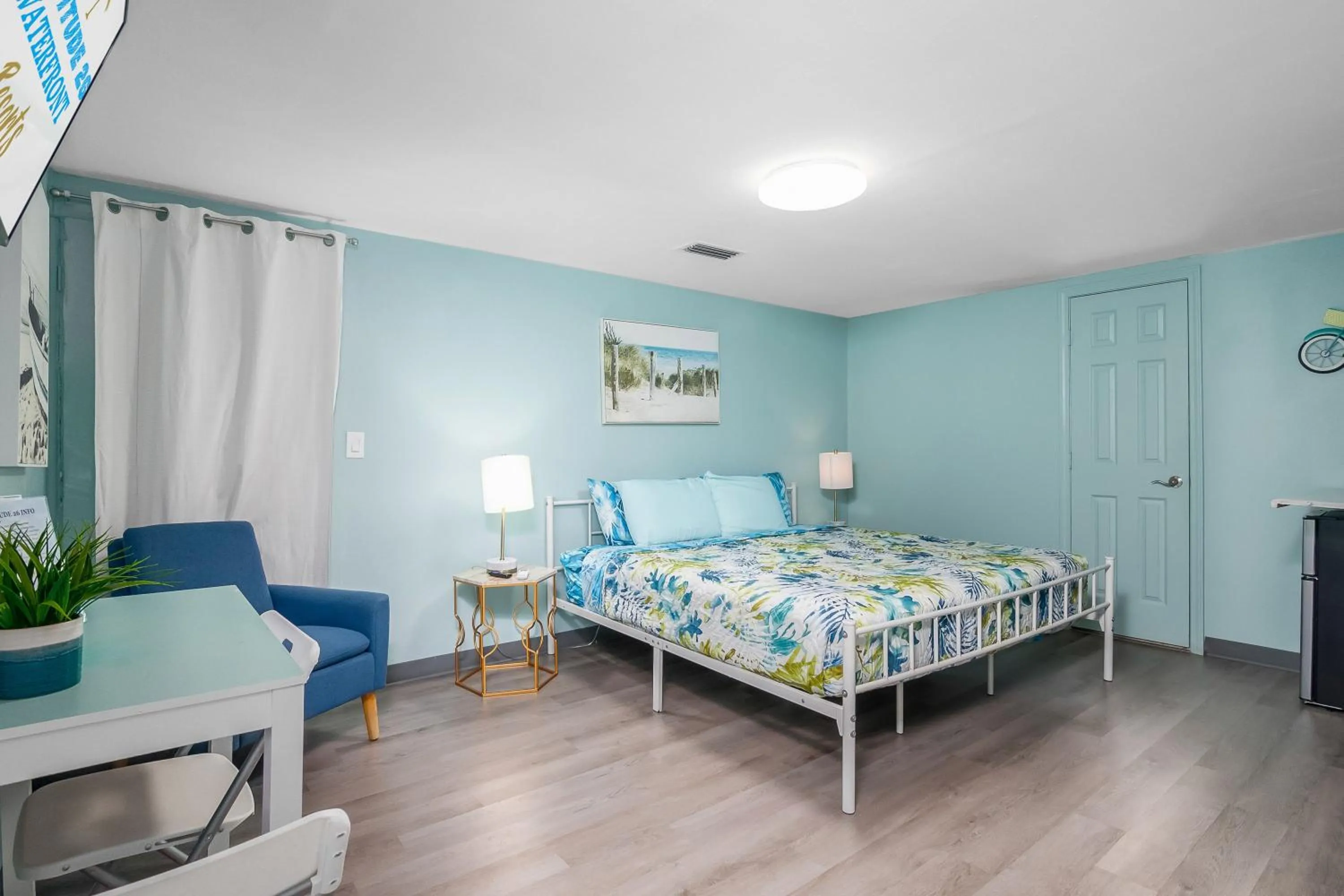 Bed in Latitude 26 Waterfront Boutique Resort - Fort Myers Beach