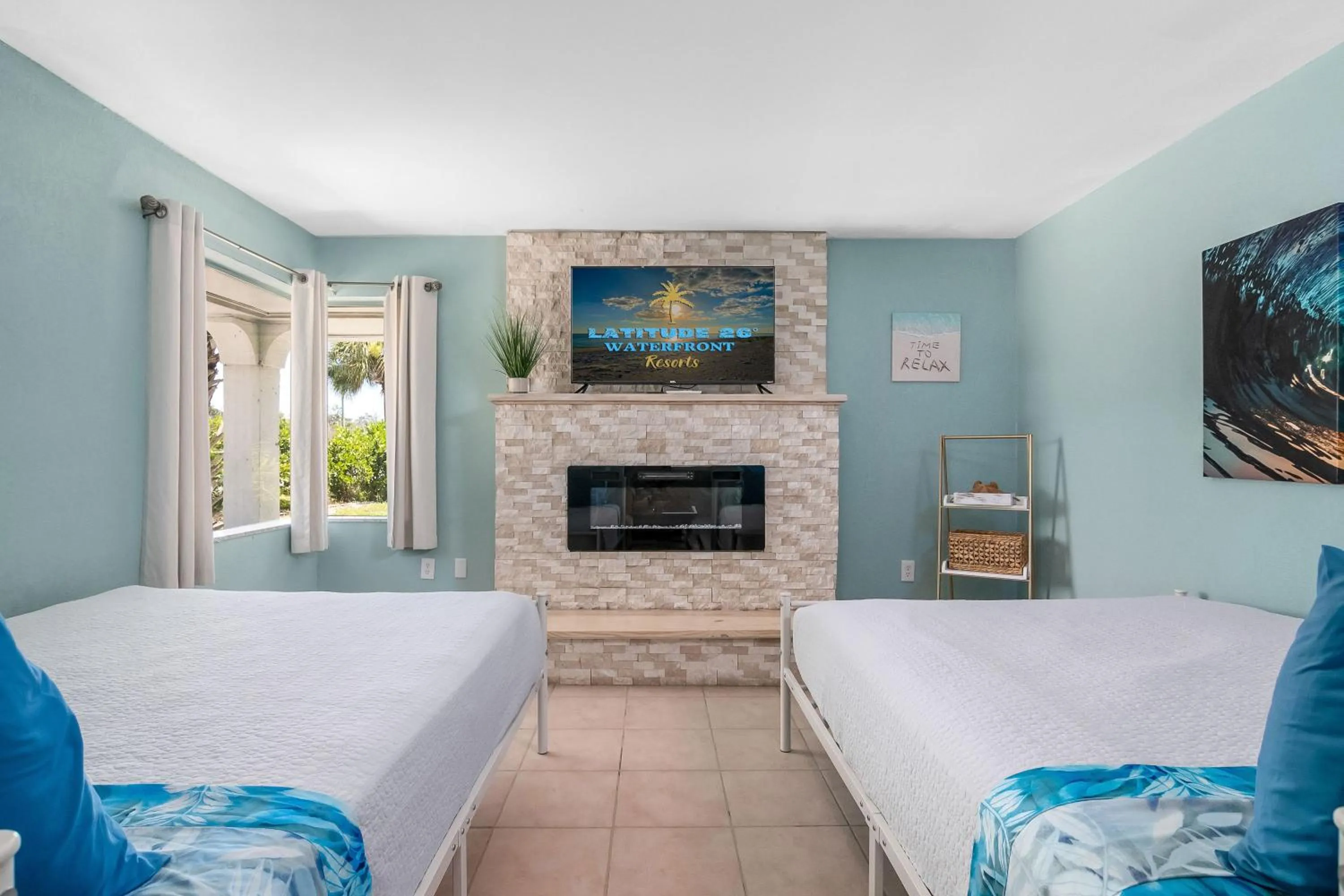Bed in Latitude 26 Waterfront Boutique Resort - Fort Myers Beach